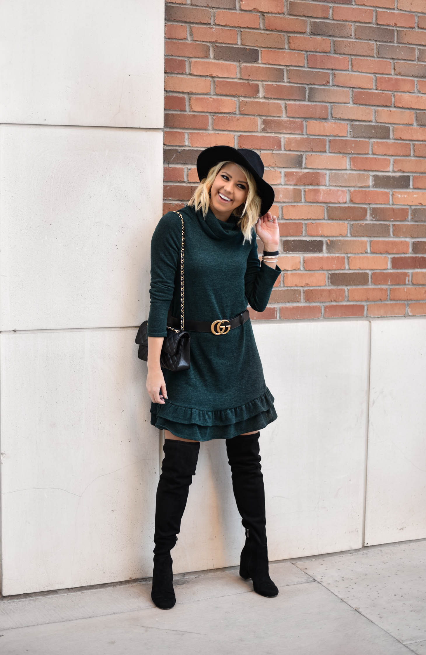 Erin Elizabeth of Wink and a Twirl Wearing Bella Rose Boutique Sweater Dress