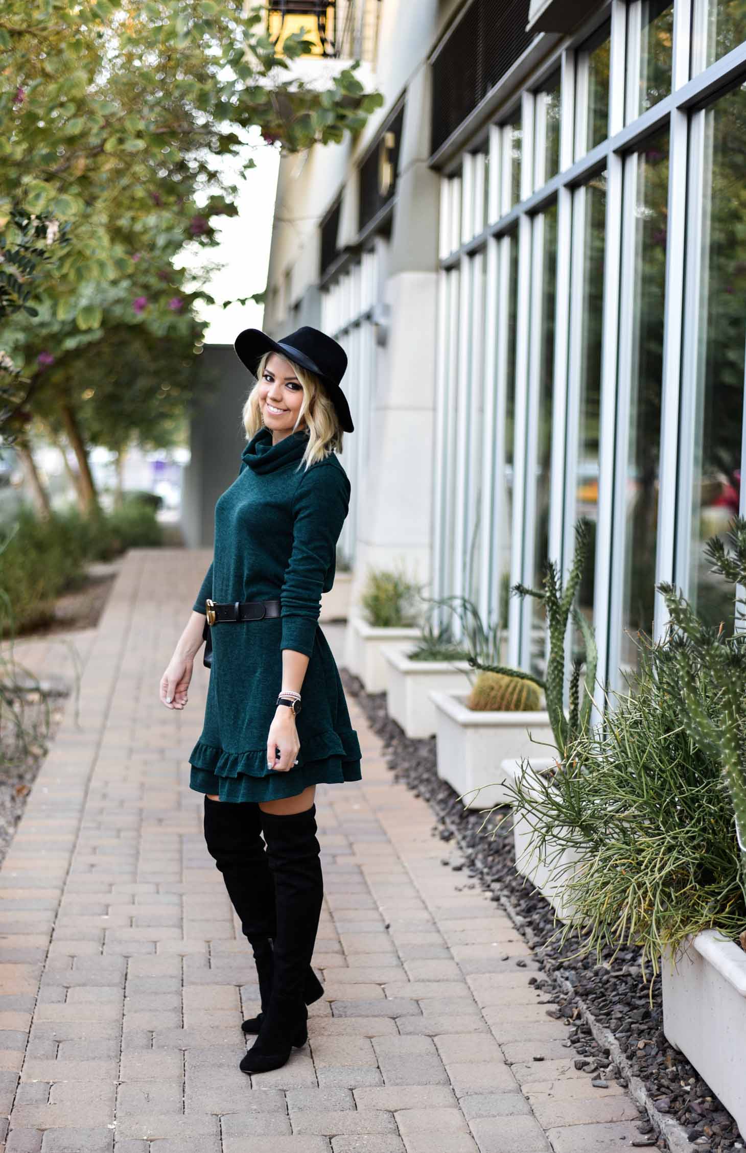 Erin Elizabeth of Wink and a Twirl Wearing Bella Rose Boutique Sweater Dress