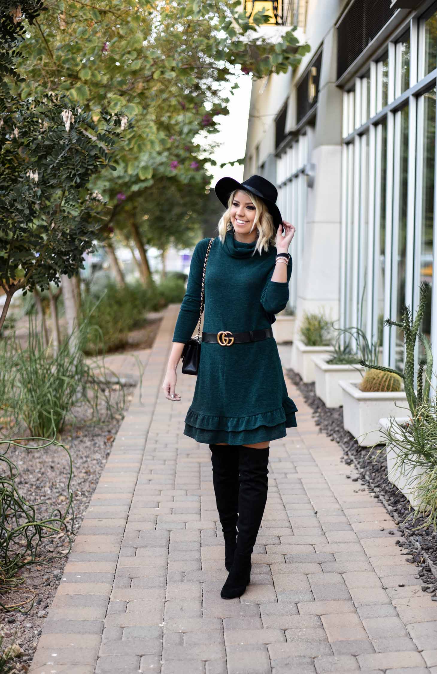 Erin Elizabeth of Wink and a Twirl Wearing Bella Rose Boutique Sweater Dress