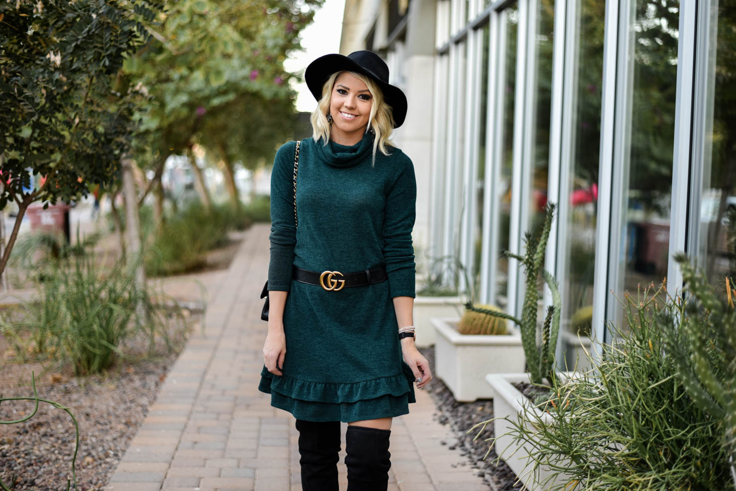 Erin Elizabeth of Wink and a Twirl Wearing Bella Rose Boutique Sweater Dress