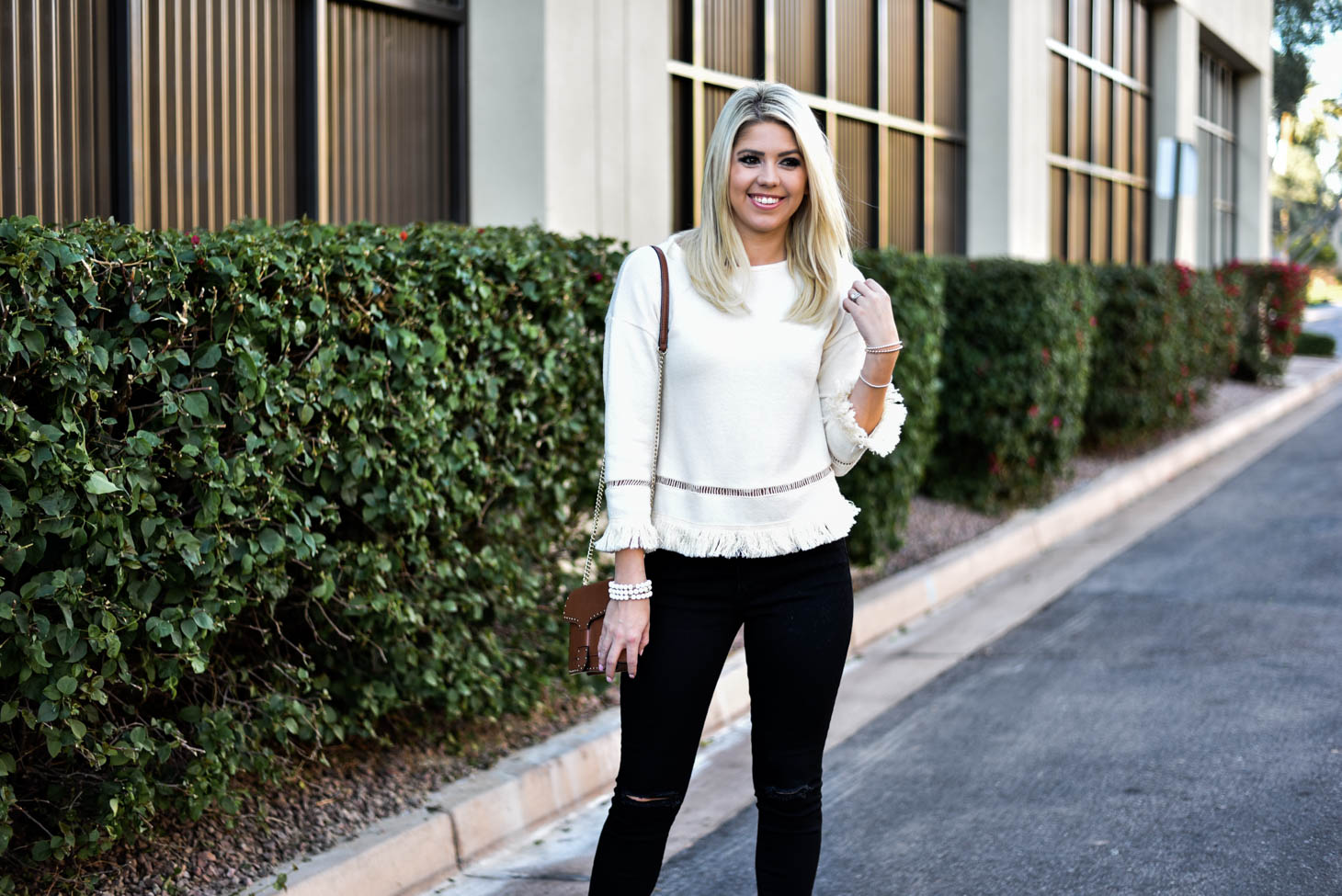 Erin Elizabeth of Wink and a Twirl in Cream Fringe Top by VIS