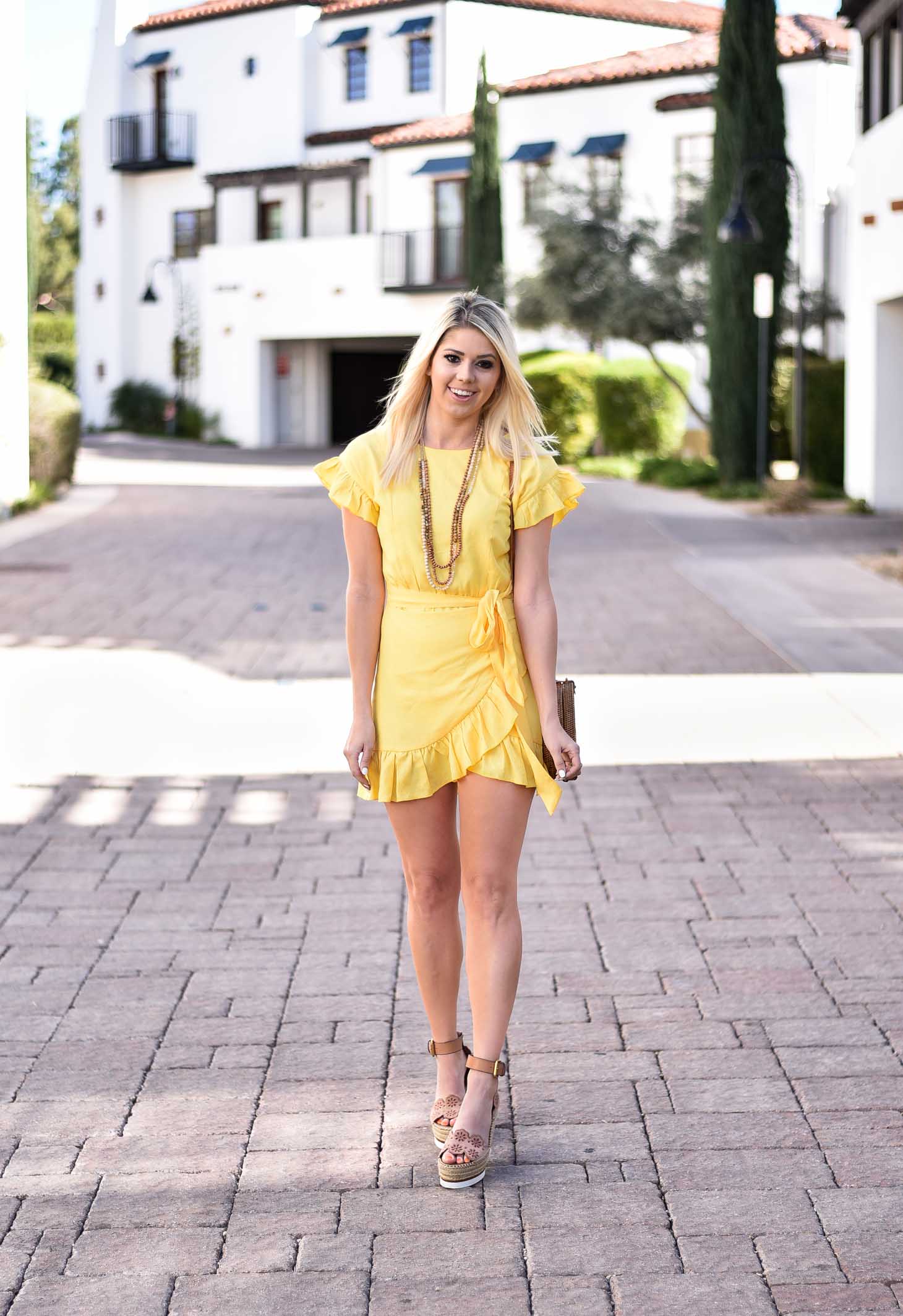 Erin Elizabeth of Wink and a Twirl in Yellow Spring Dress