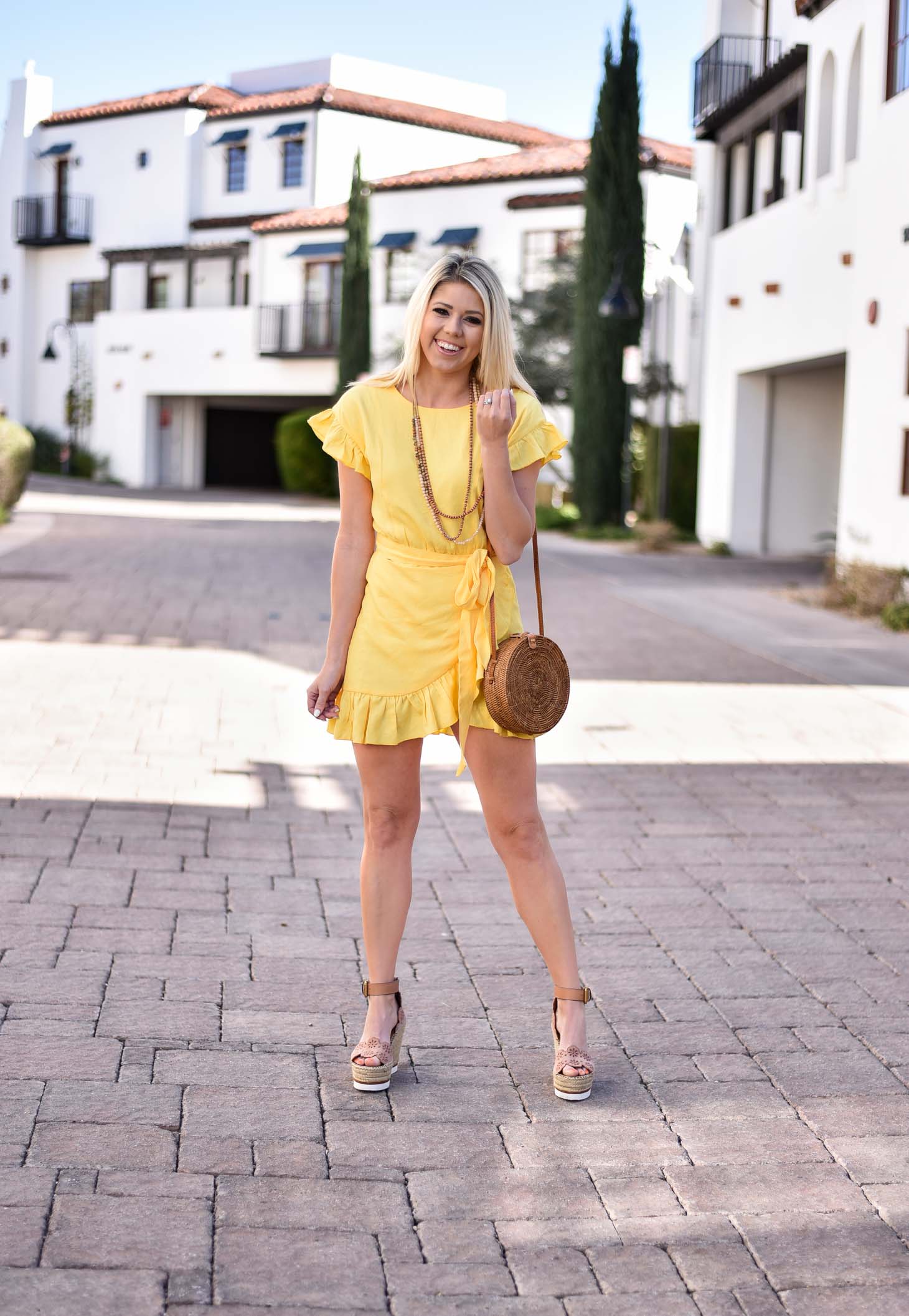 Erin Elizabeth of Wink and a Twirl in Yellow Spring Dress