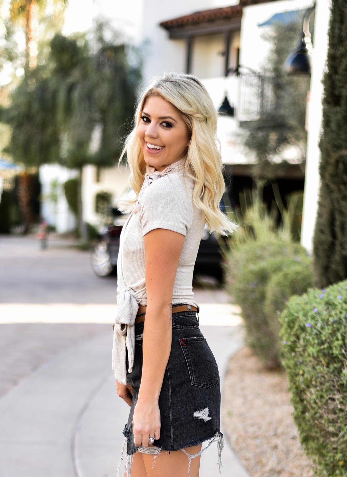 Erin Elizabeth of Wink and a Twirl Spring Style With Urban Outfitters Black Denim Skirt 