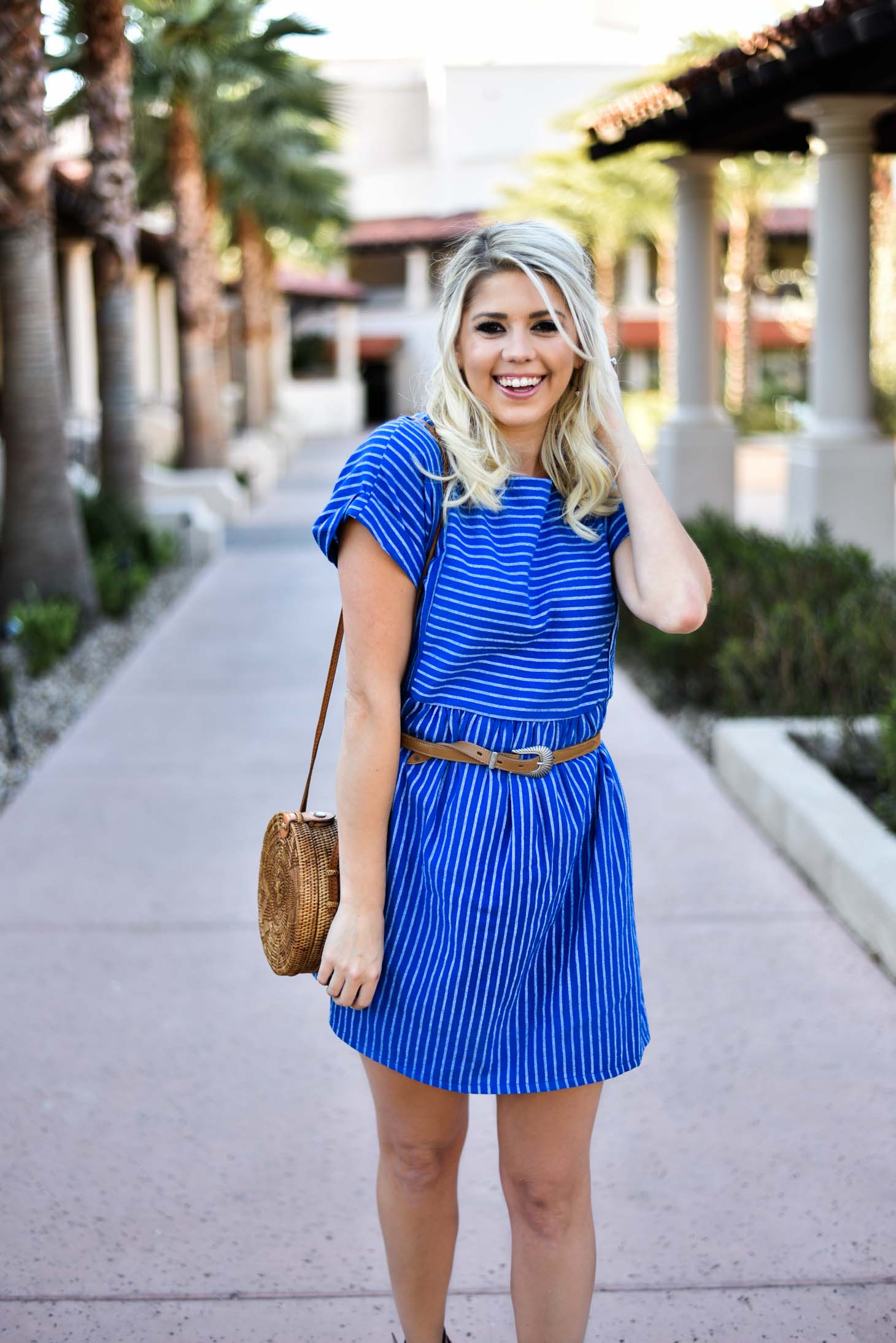 Erin Elizabeth of Wink and a Twirl in Spring Striped Blue Dress