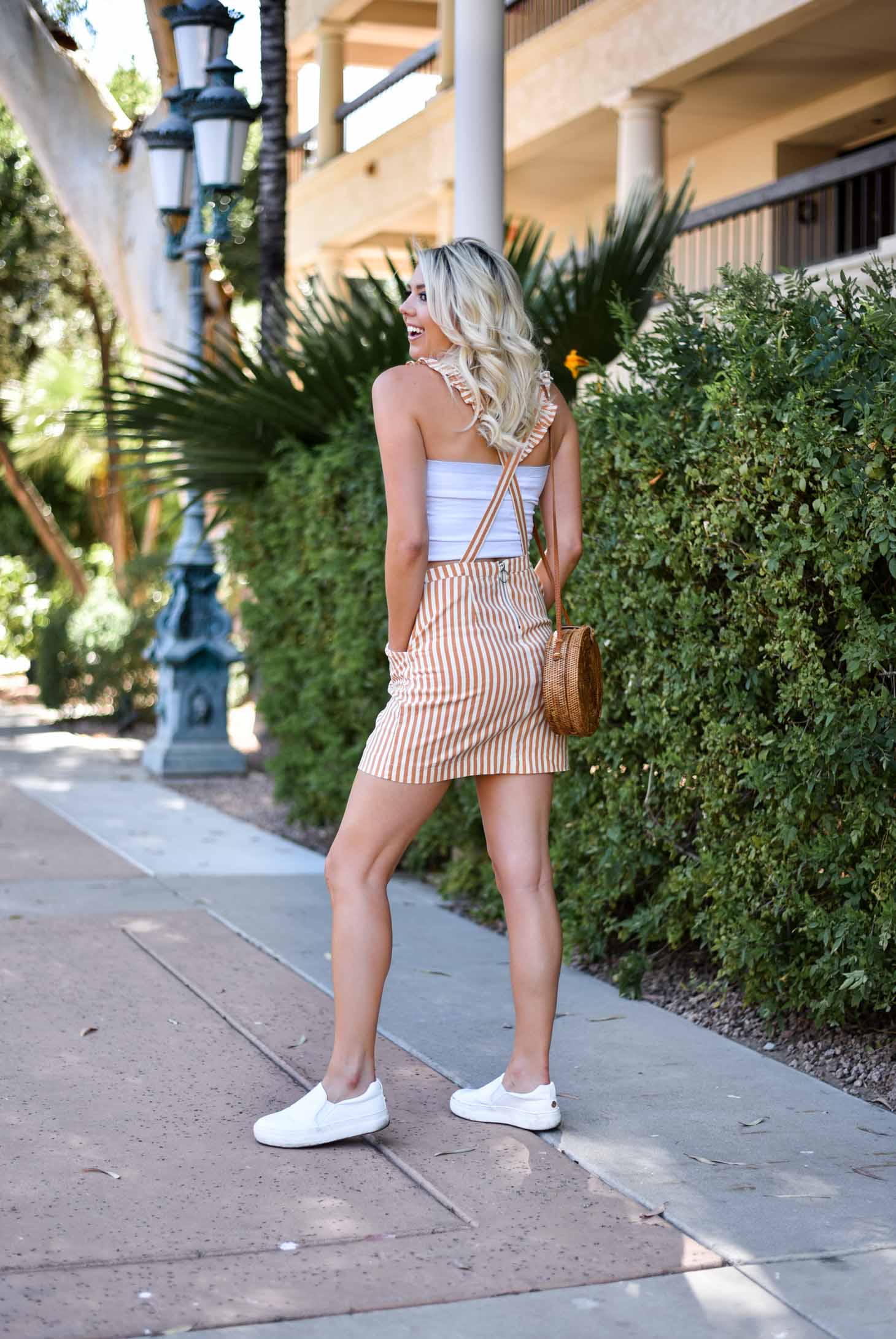 Erin Elizabeth of Wink and a Twirl in this Urban Outfitters Striped Jumper Spring Style