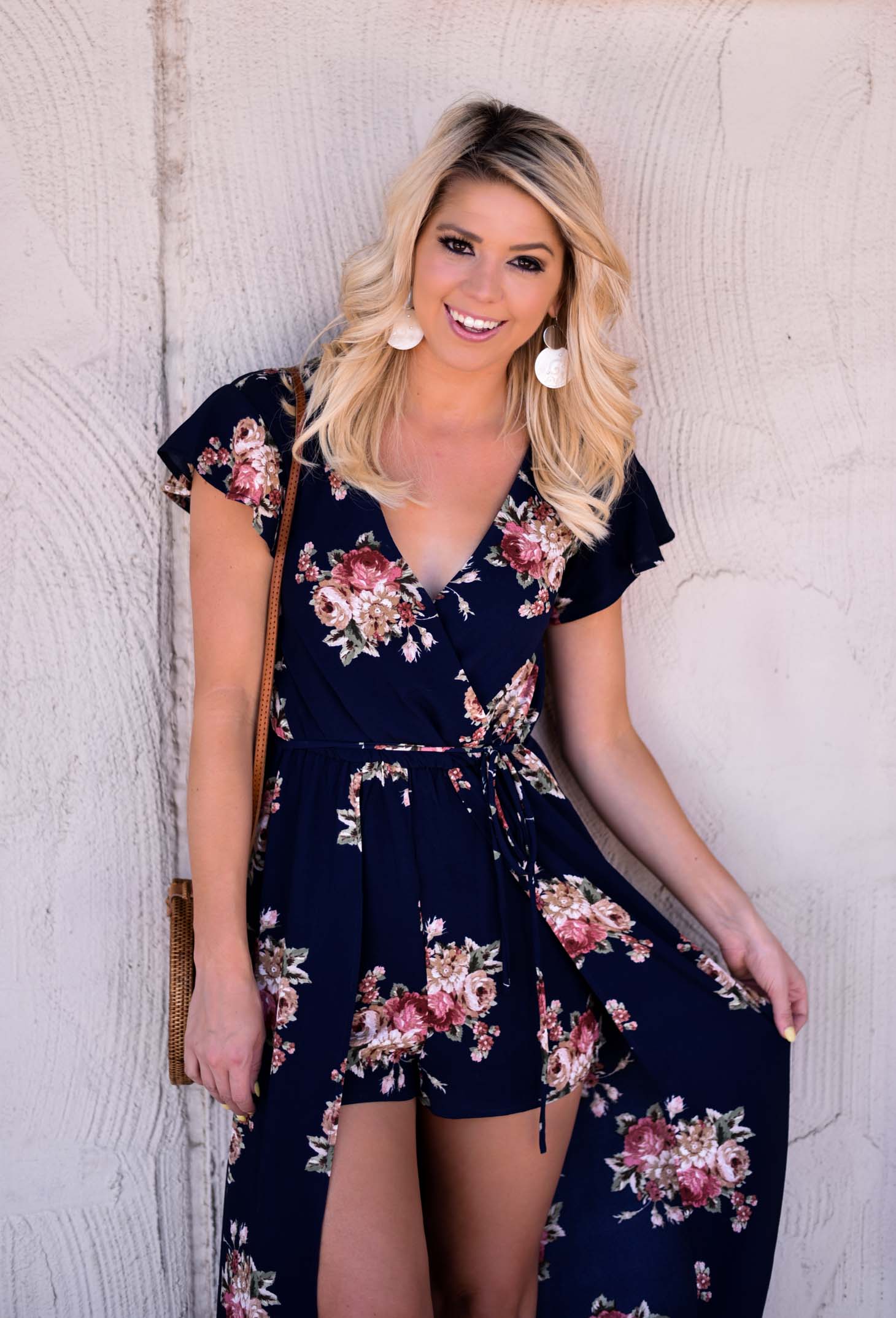 Erin Elizabeth of Wink and a Twirl in Neugent Spring Floral Romper Dress