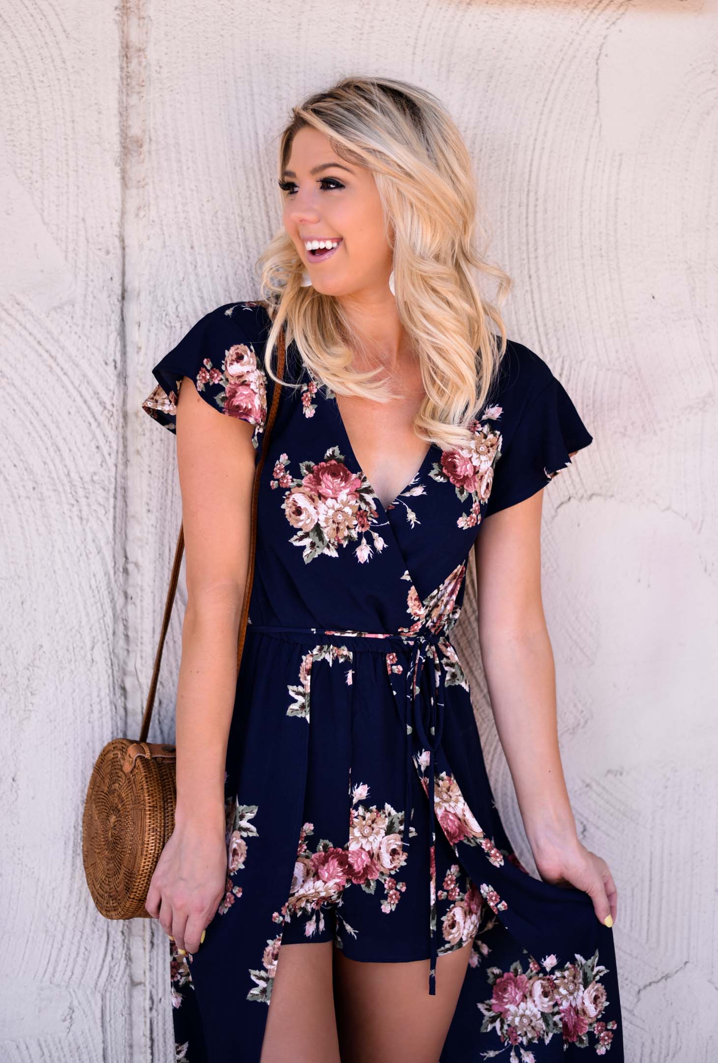 Erin Elizabeth of Wink and a Twirl in Neugent Spring Floral Romper Dress