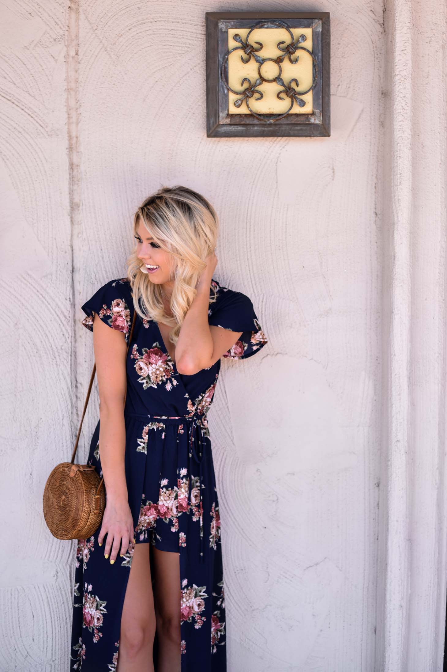 Erin Elizabeth of Wink and a Twirl in Neugent Spring Floral Romper Dress