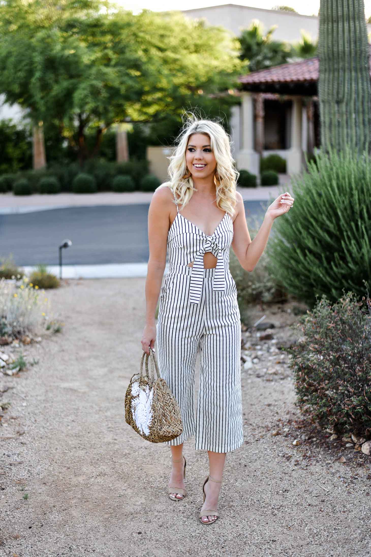 Erin Elizabeth of Wink and a Twirl shares this Mason Jar Boutique Striped Jumpsuit with cutout and tie detail for summer style 