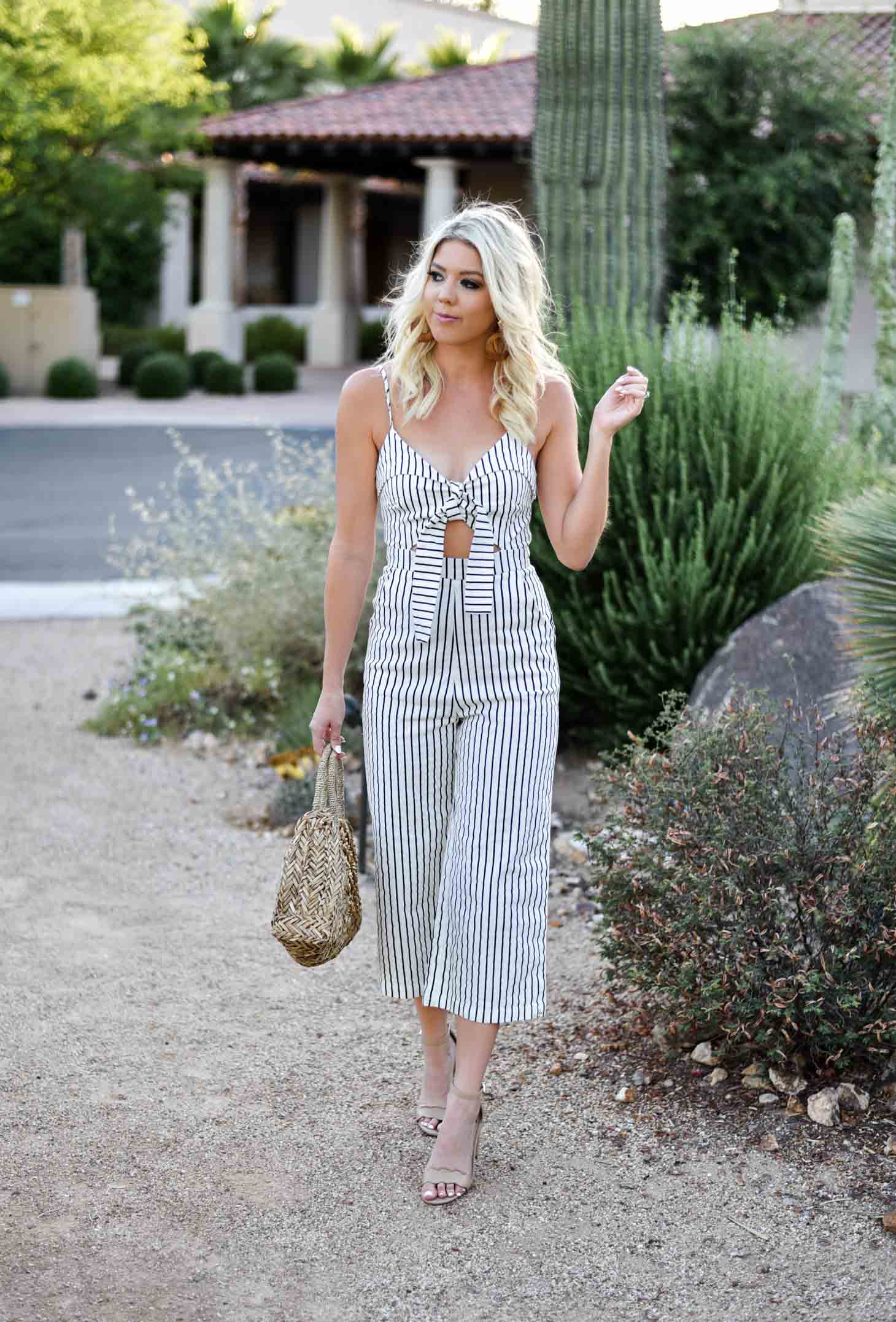 Erin Elizabeth of Wink and a Twirl shares this Mason Jar Boutique Striped Jumpsuit with cutout and tie detail for summer style 