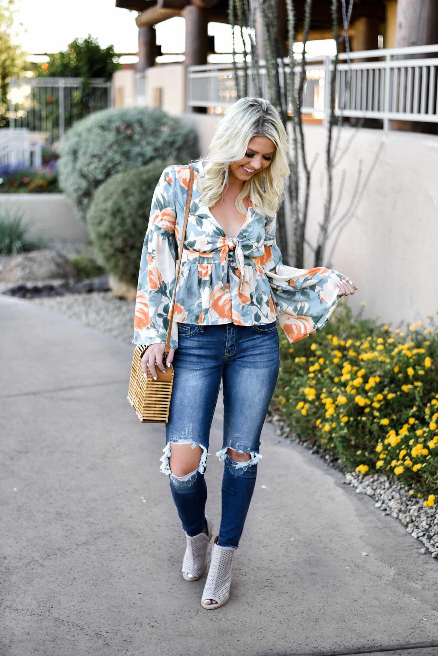 Erin Elizabeth of Wink and a Twirl in this Vici Dolls Jeans and Summer Floral Top