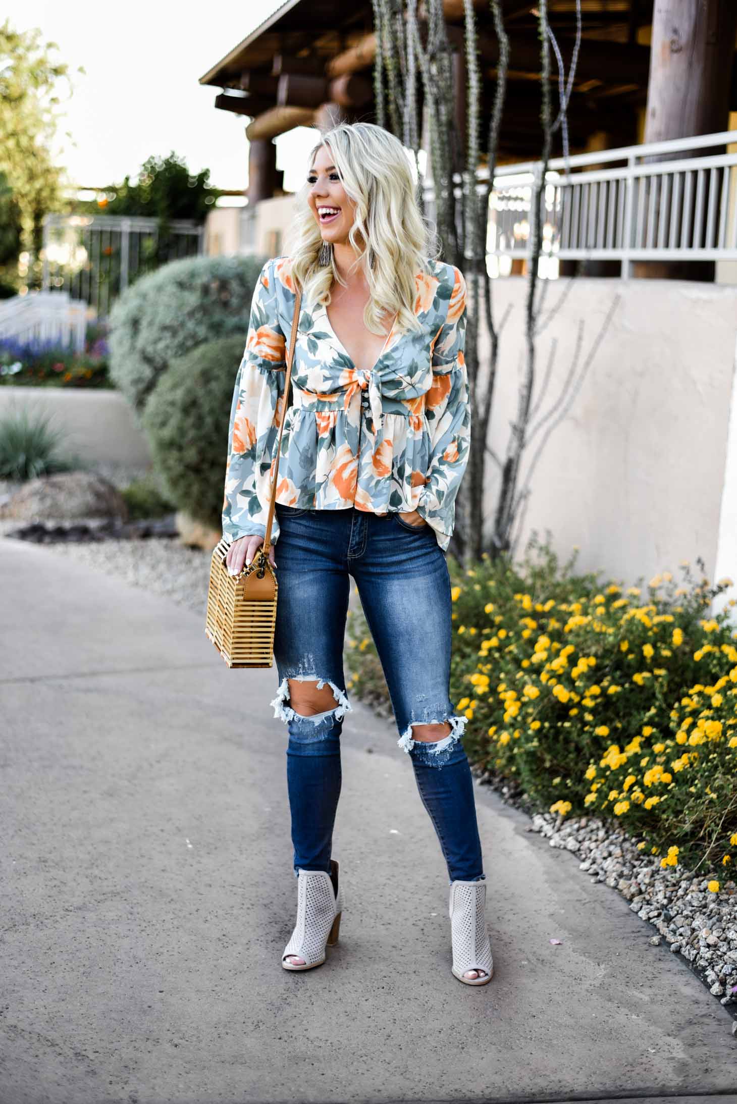 Erin Elizabeth of Wink and a Twirl in this Vici Dolls Jeans and Summer Floral Top