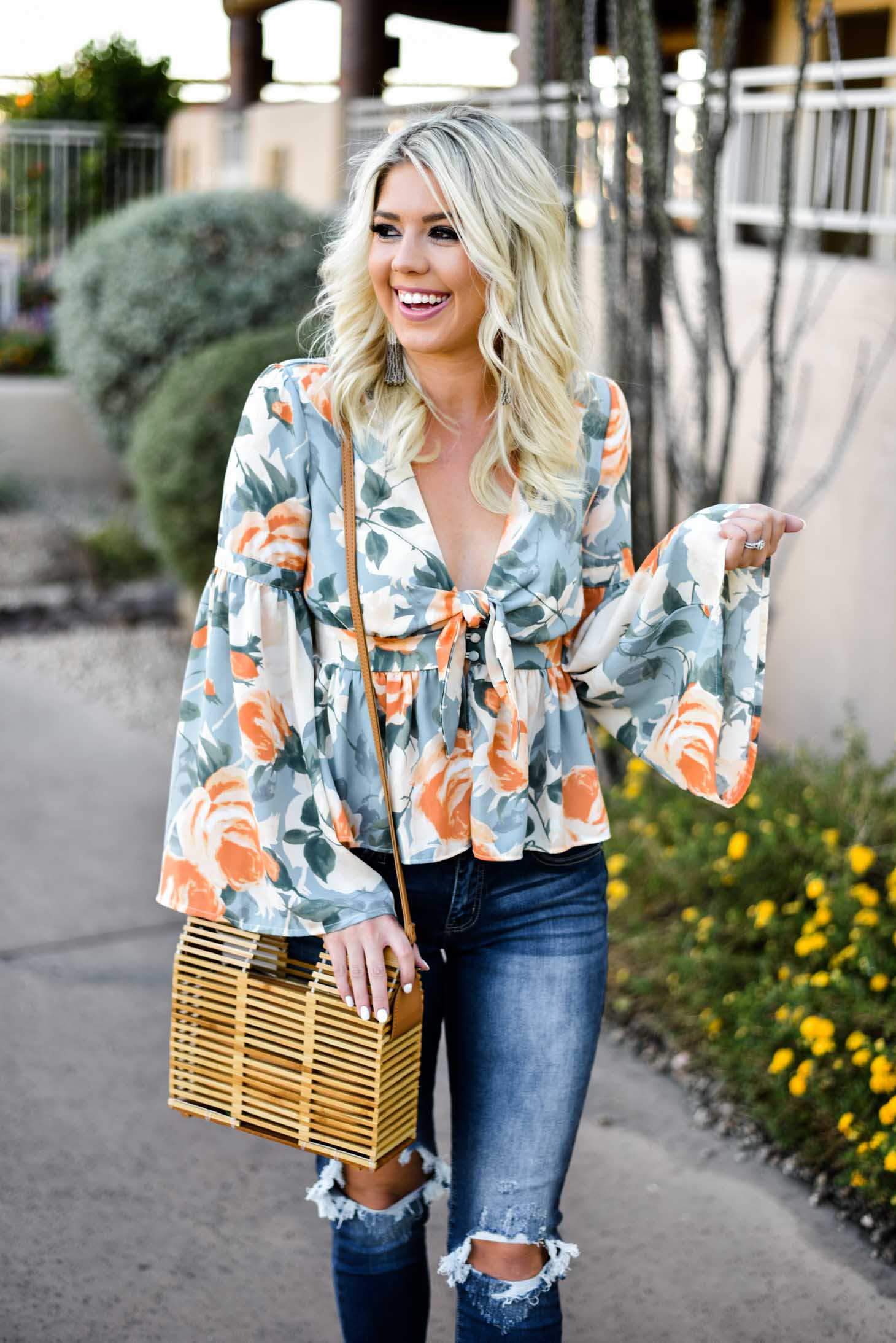 Erin Elizabeth of Wink and a Twirl in this Vici Dolls Jeans and Summer Floral Top