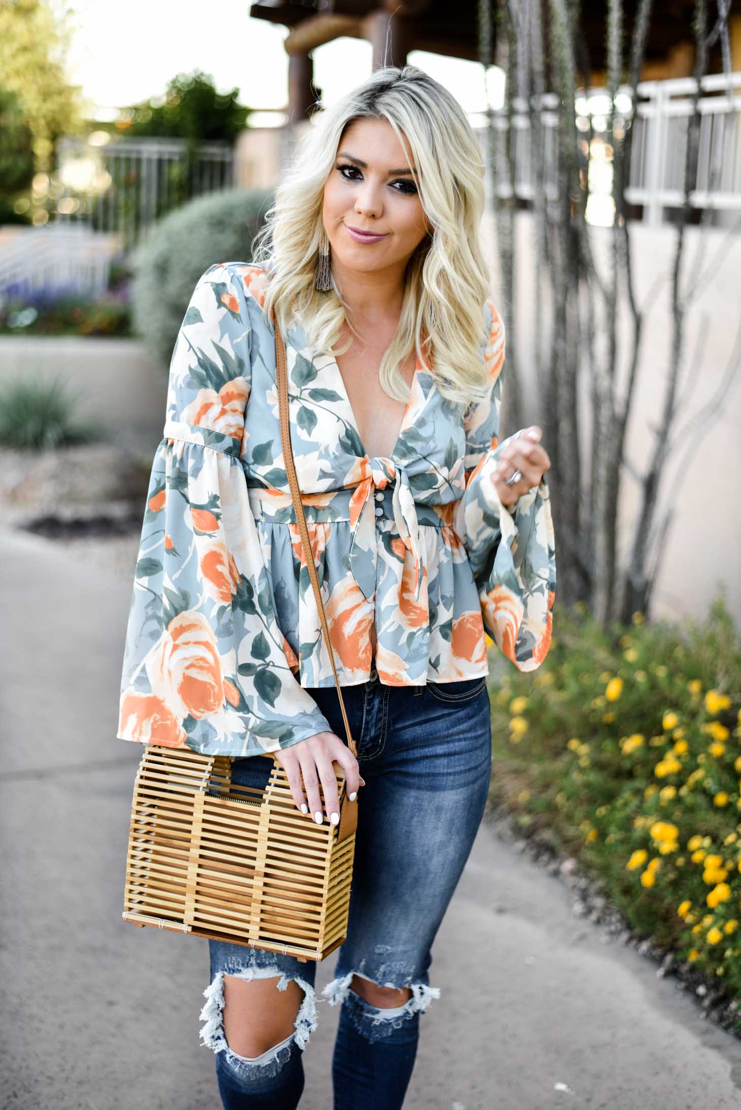 Erin Elizabeth of Wink and a Twirl in this Vici Dolls Jeans and Summer Floral Top