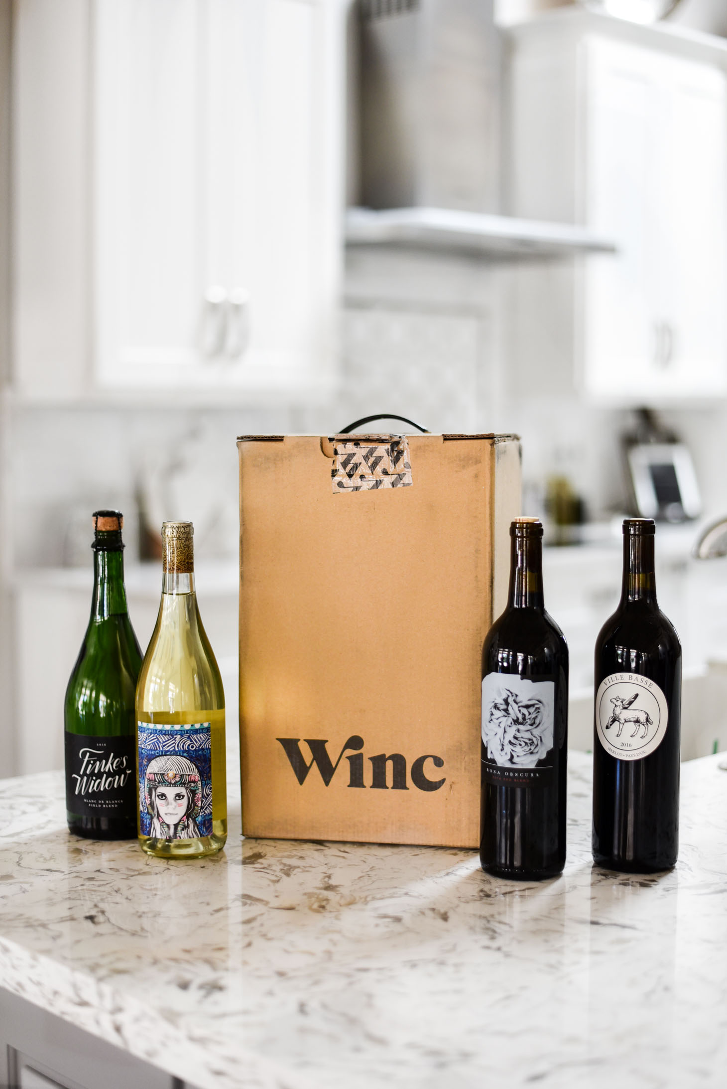 Erin Elizabeth of Wink and a Twirl shares a Wine Club box called Winc with personalized wine selections 