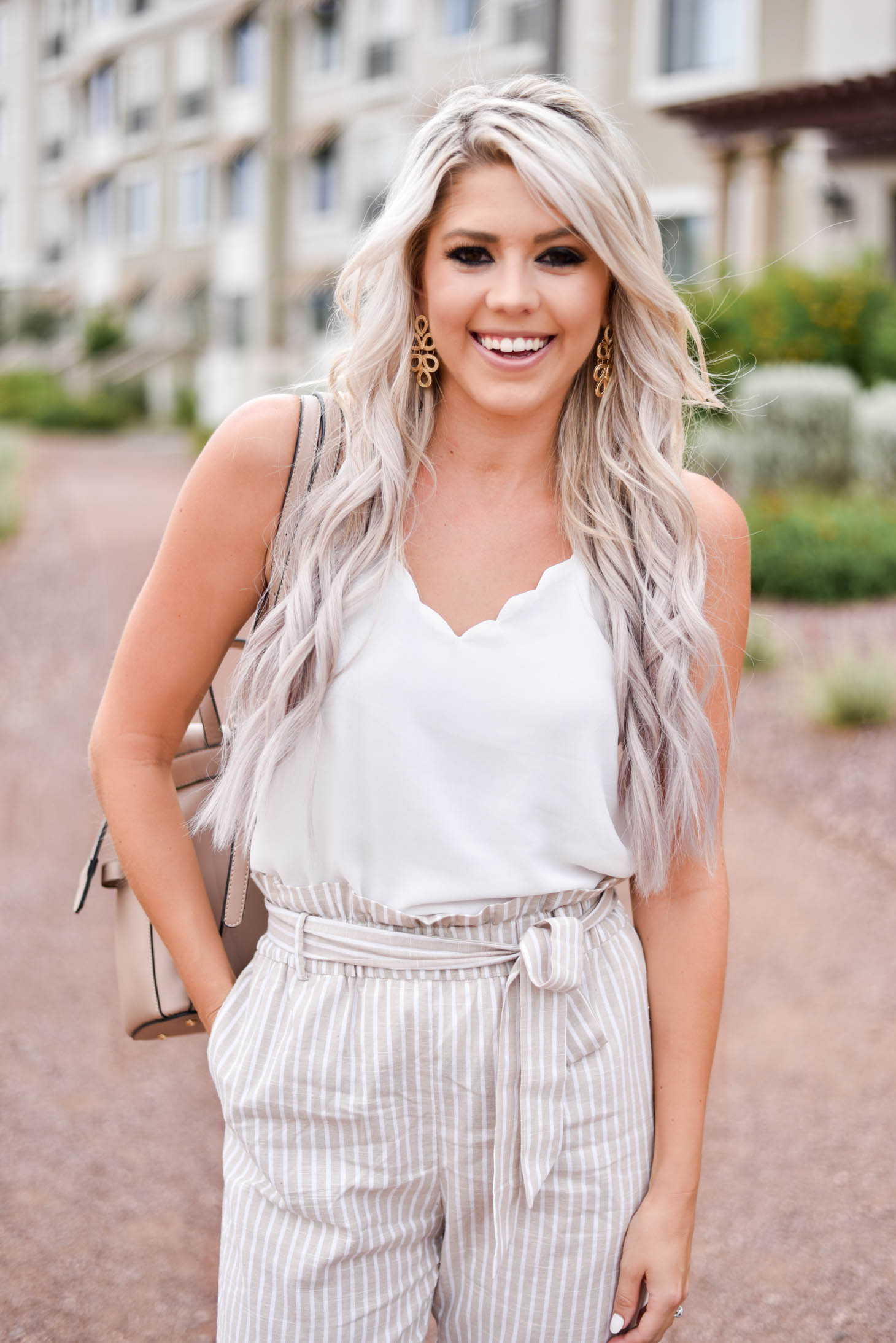 Erin Elizabeth of Wink and a Twirl shares this Red Dress Boutique look with the cutest highwaist pants ad white cami