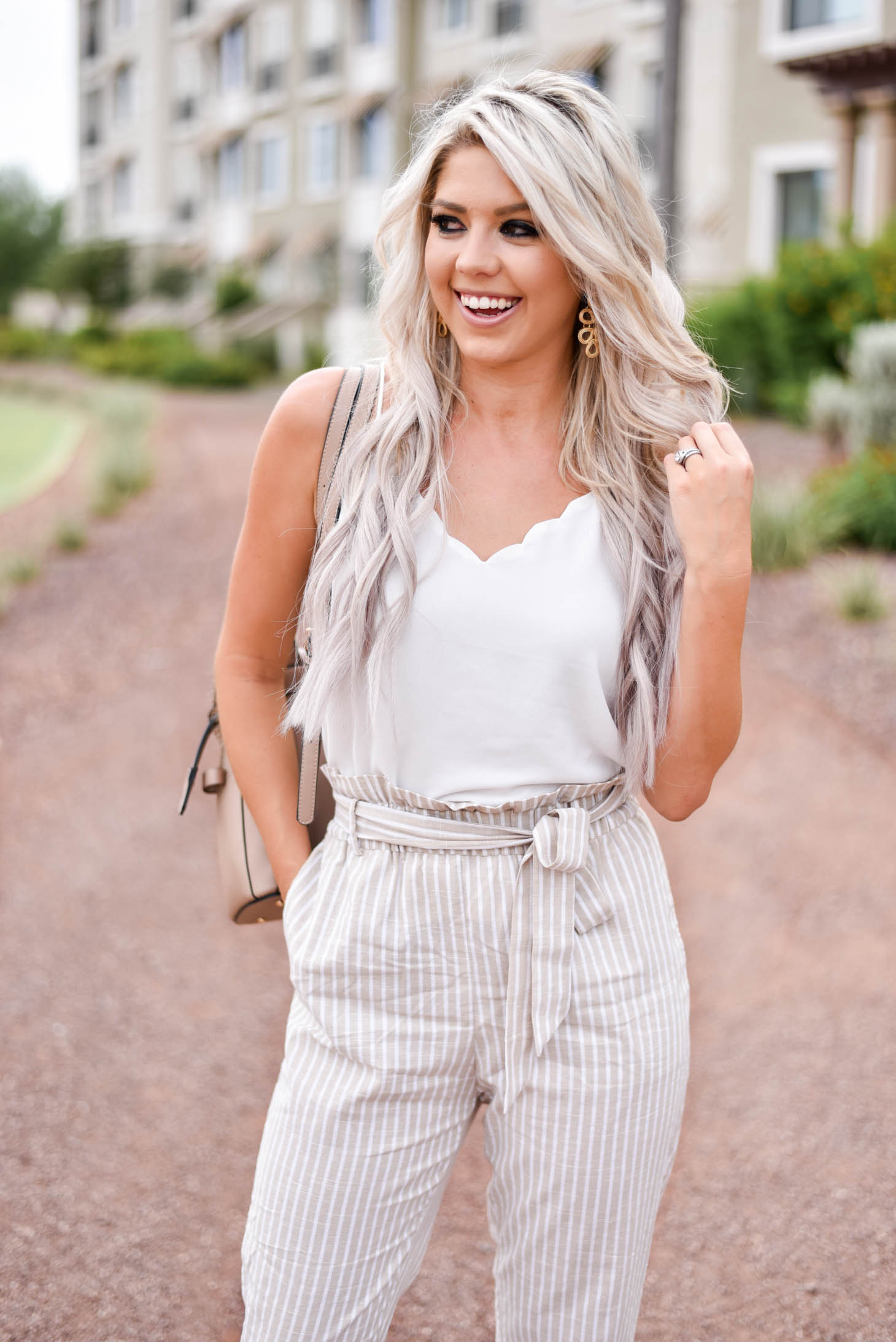 Erin Elizabeth of Wink and a Twirl shares this Red Dress Boutique look with the cutest highwaist pants ad white cami