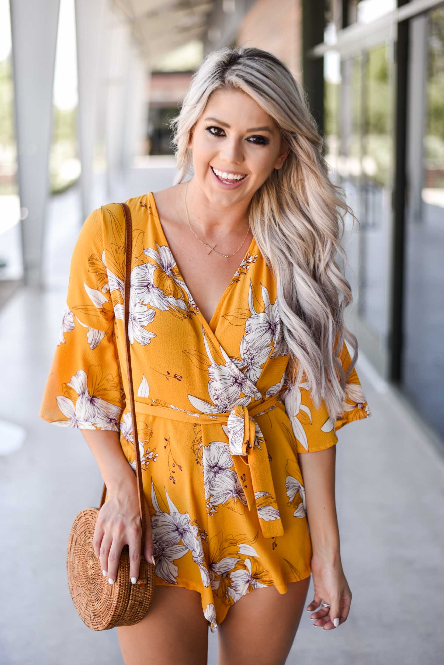 Erin Elizabeth of Wink and a Twirl shares this cute yellow romper from Chicwish perfect for Summer and Fall style