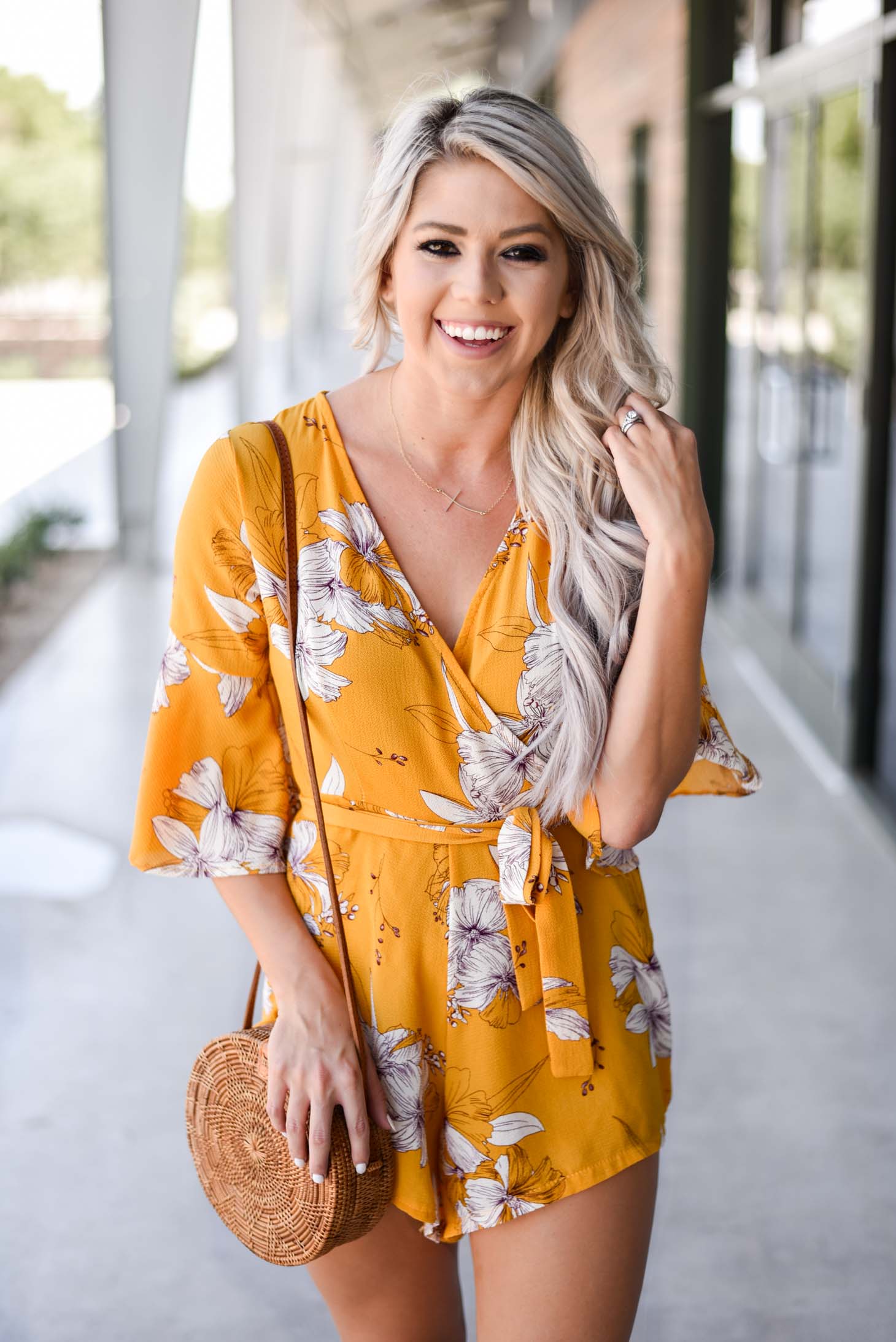 Erin Elizabeth of Wink and a Twirl shares this cute yellow romper from Chicwish perfect for Summer and Fall style