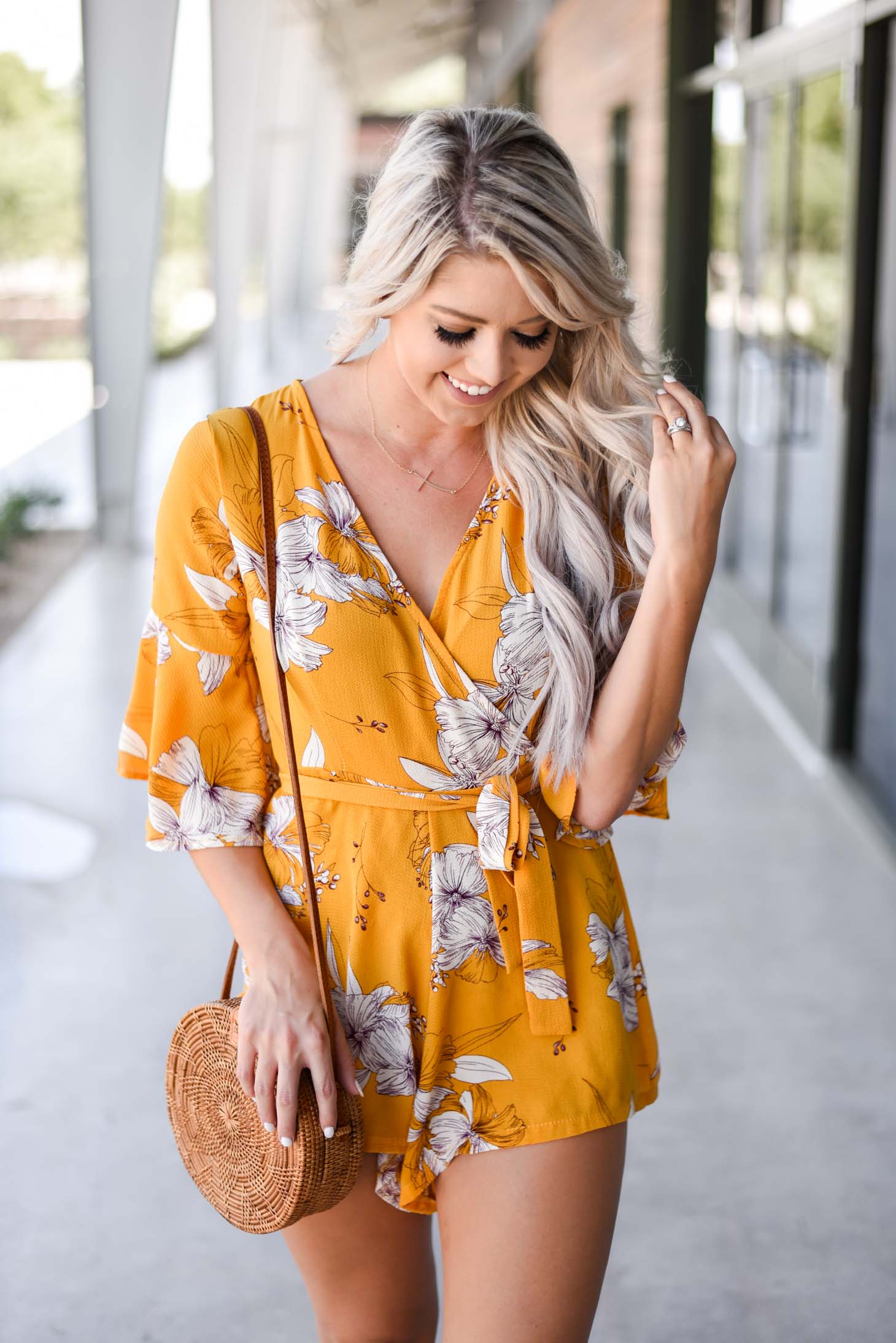 Erin Elizabeth of Wink and a Twirl shares this cute yellow romper from Chicwish perfect for Summer and Fall style
