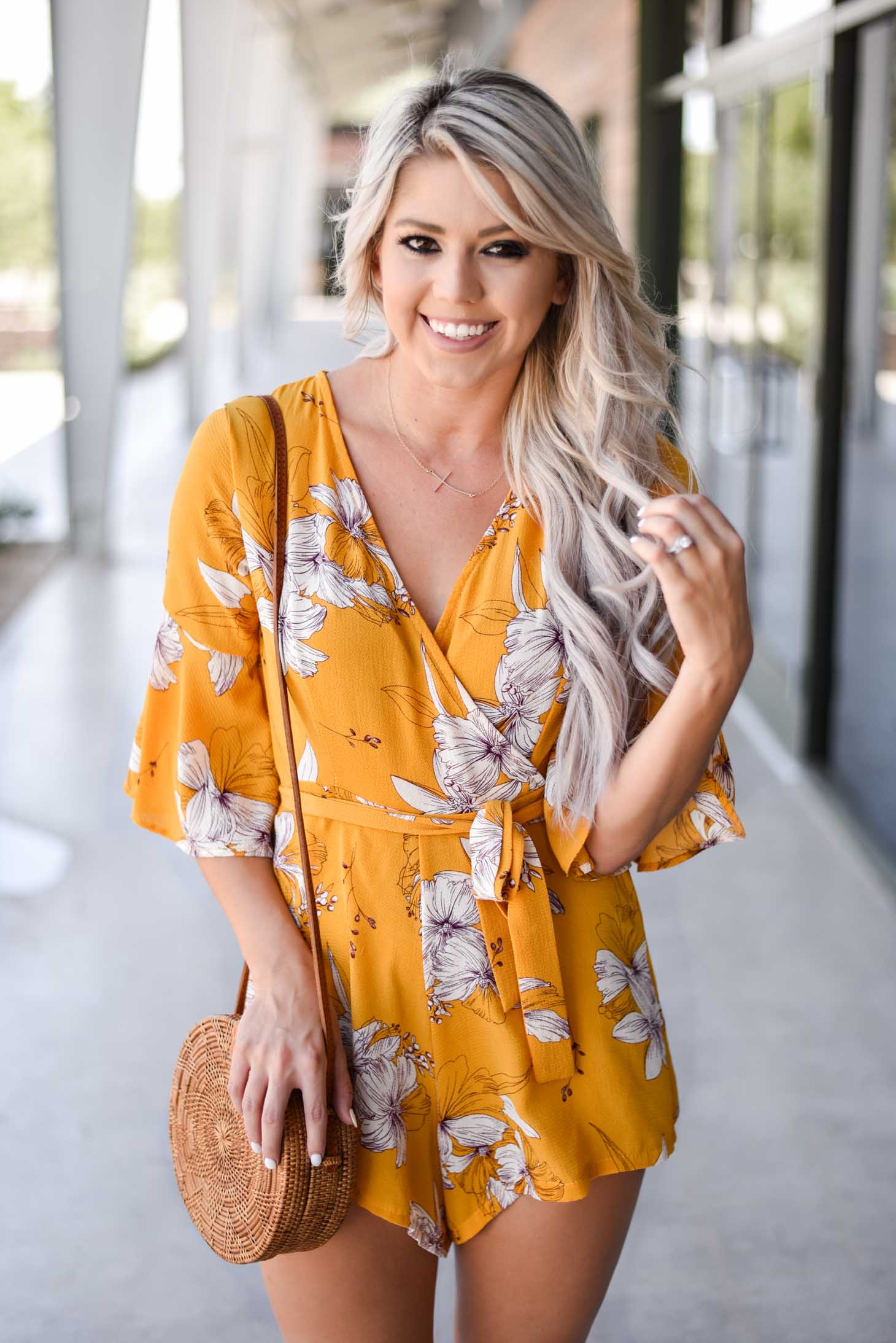 Erin Elizabeth of Wink and a Twirl shares this cute yellow romper from Chicwish perfect for Summer and Fall style