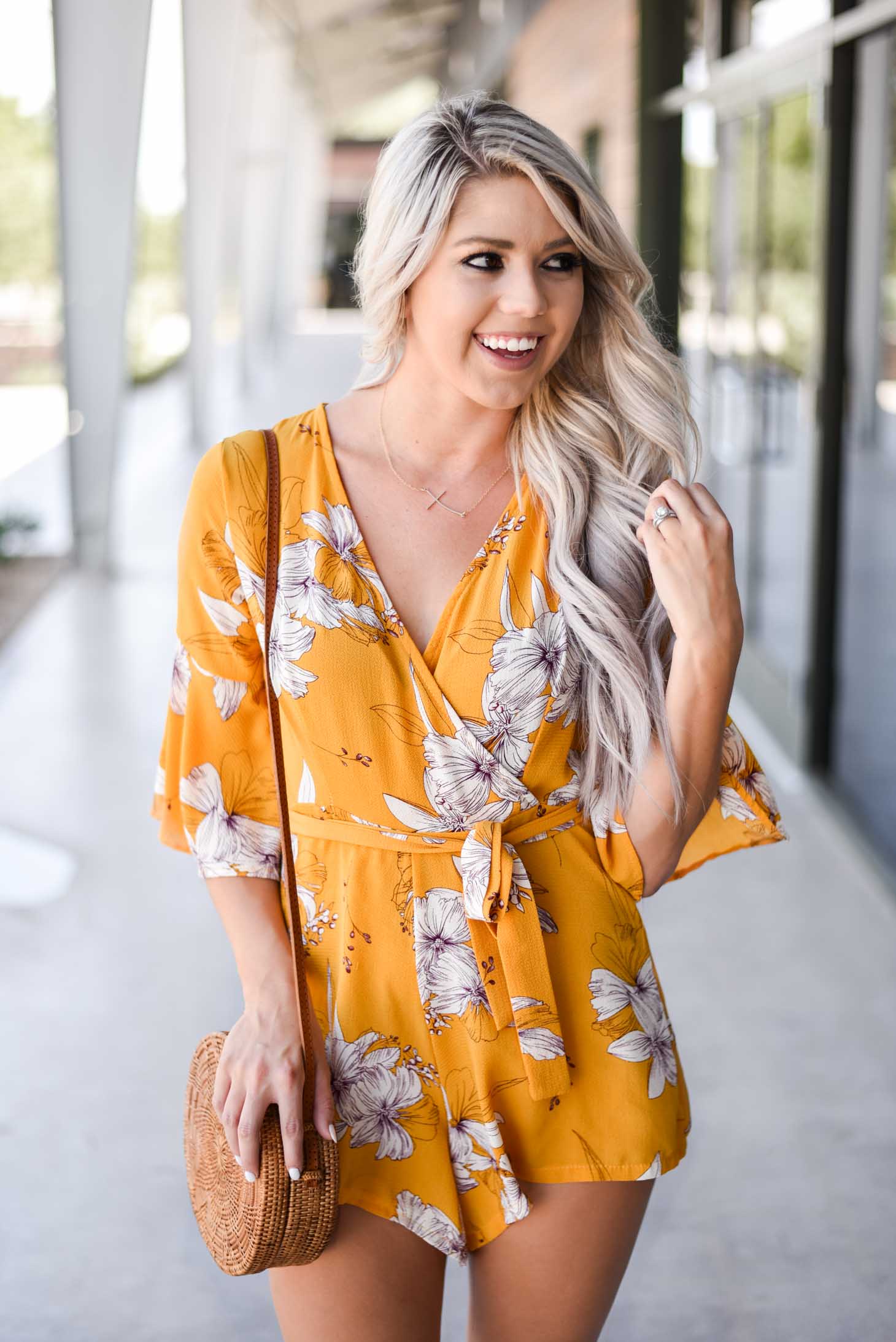 Erin Elizabeth of Wink and a Twirl shares this cute yellow romper from Chicwish perfect for Summer and Fall style