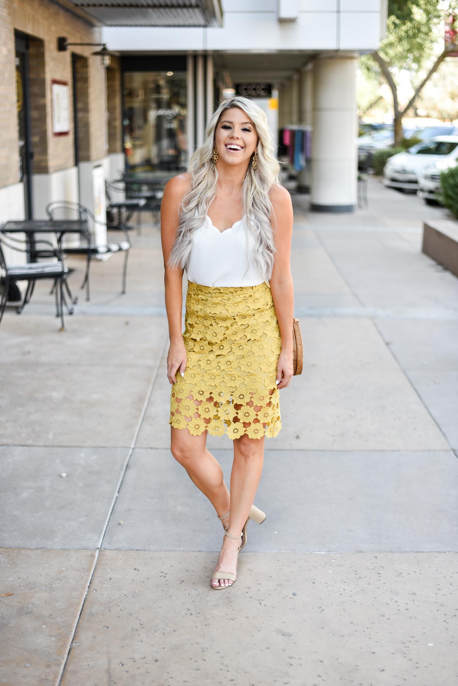 Erin Elizabeth of Wink and a Twirl shares the cutest yellow lace midi skirt 