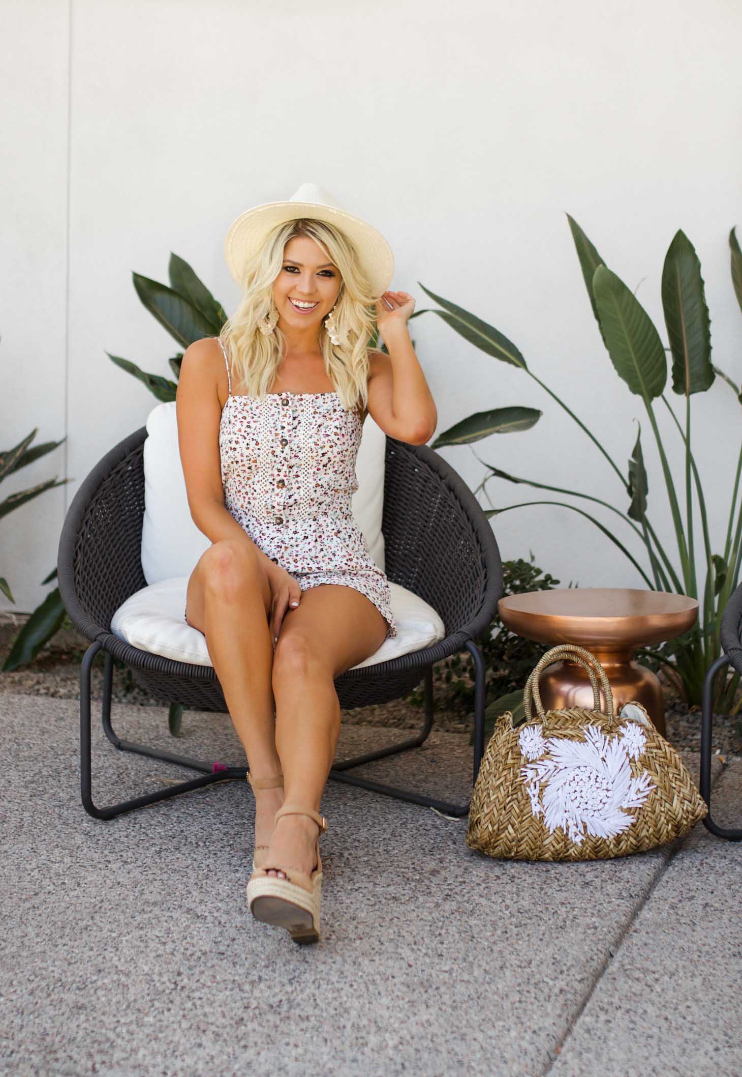 Erin Elizabeth of Wink and a Twirl shares the cutest floral romper on her recent staycation with there blogger babes at the Hotel Adeline in Scottsdale, Arizona
