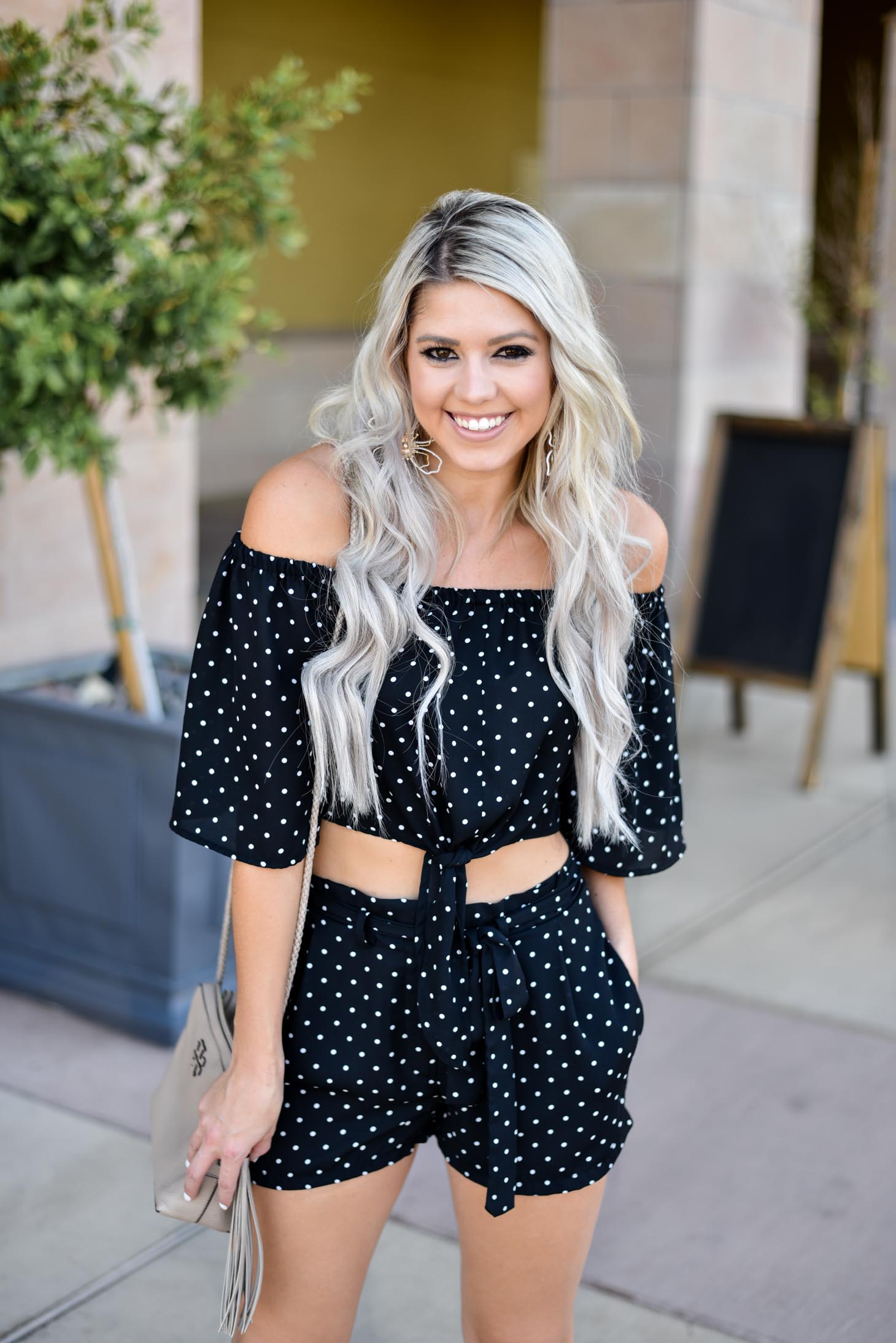 Erin Elizabeth of Wink and a Twirl shares the cutest polka dot two piece set from Shop Priceless