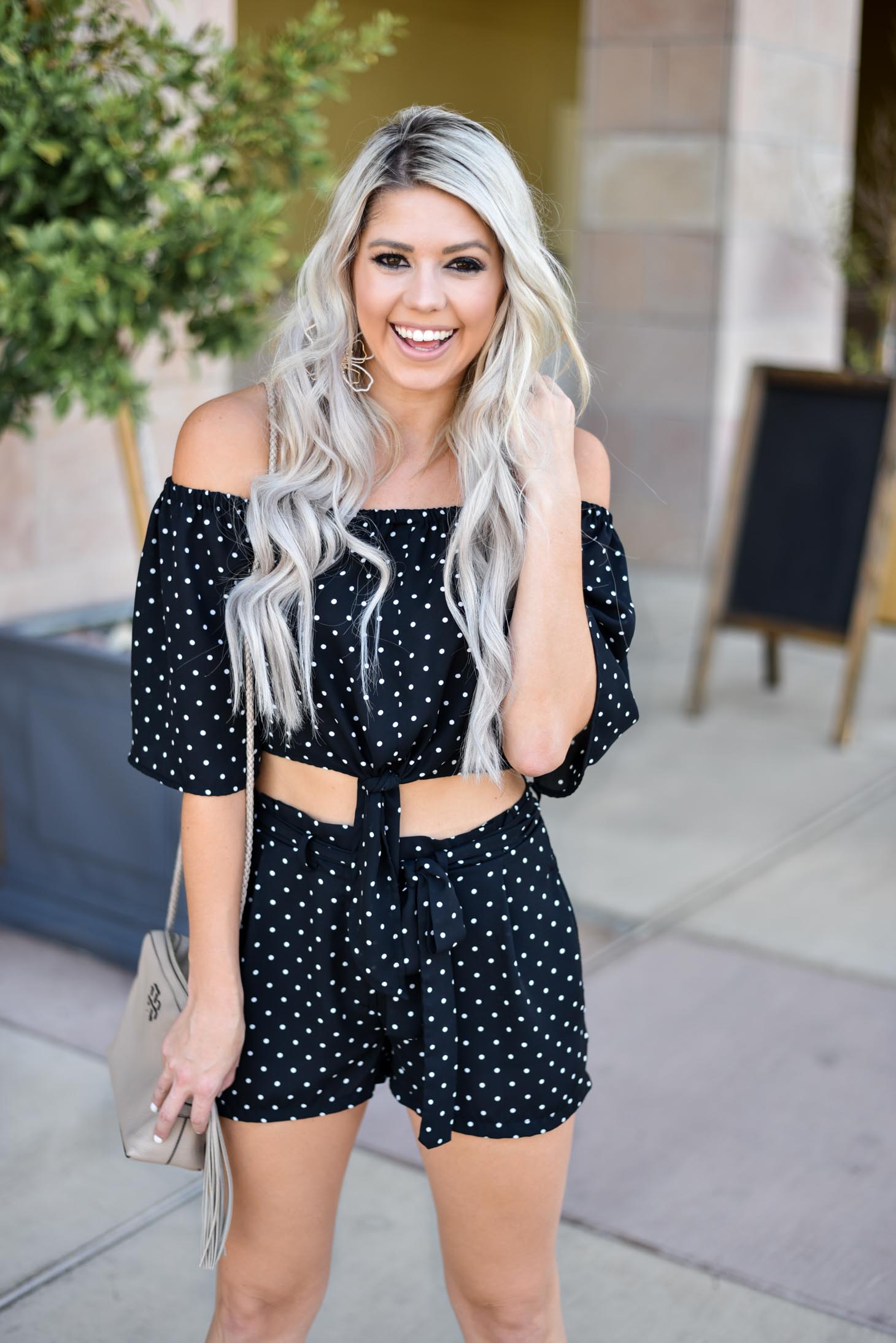 Erin Elizabeth of Wink and a Twirl shares the cutest polka dot two piece set from Shop Priceless