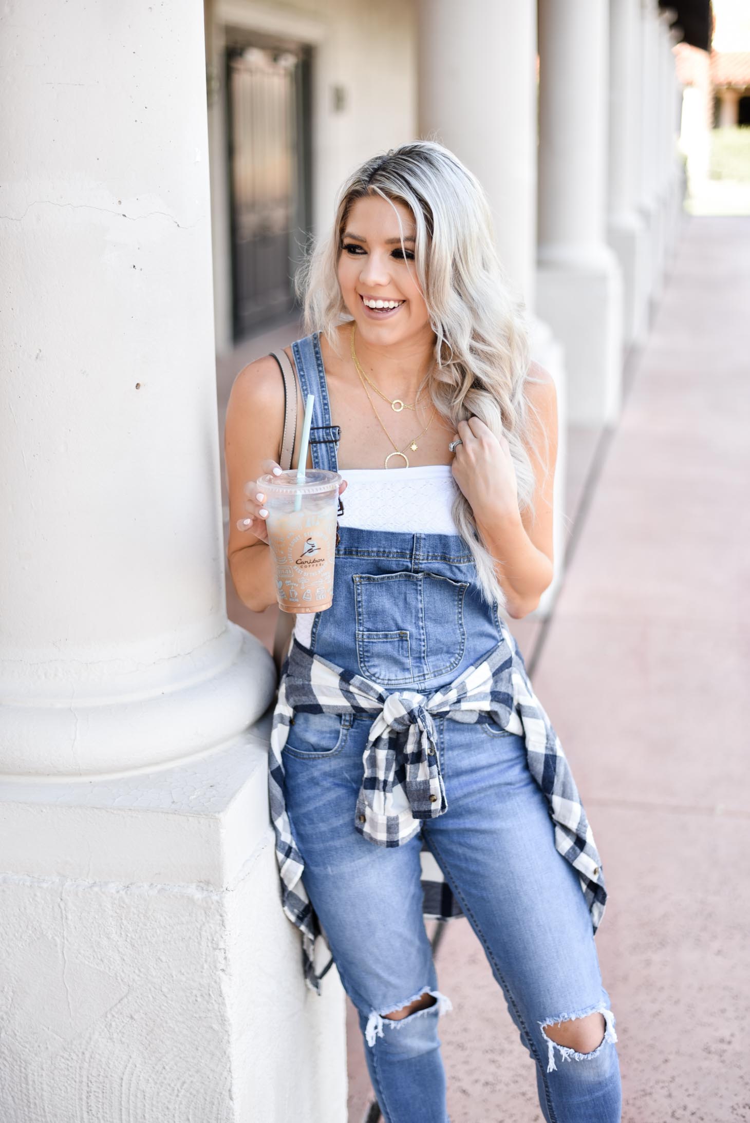 Erin Elizabeth of Wink and a Twirl shares the overall jeans you need from Pink Lily Boutique this Fall 