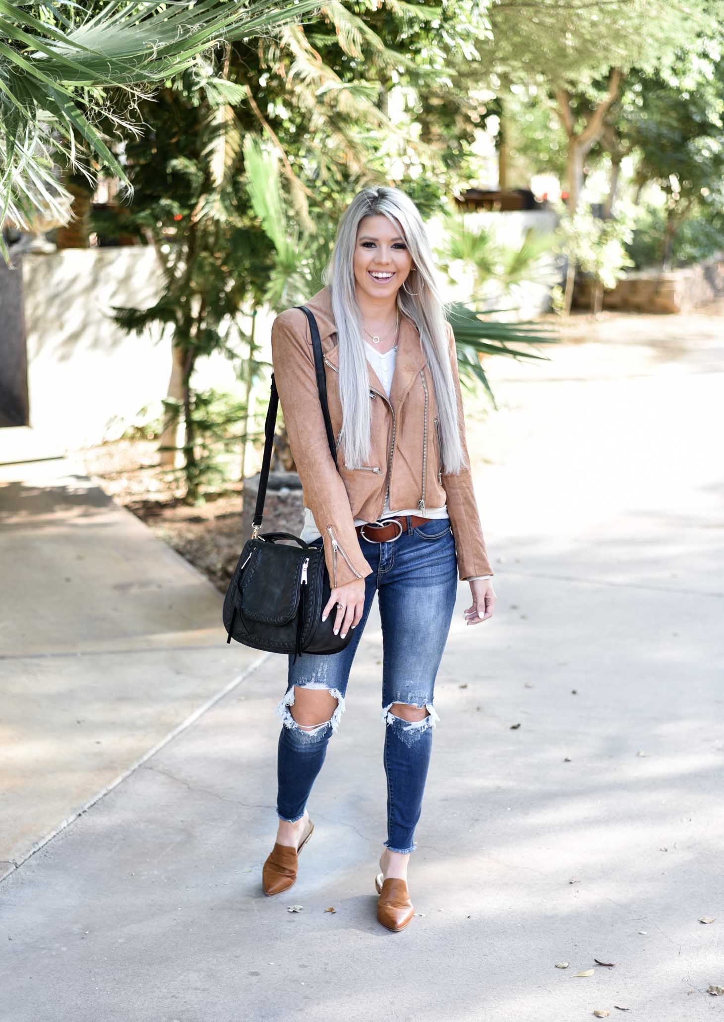 Erin Elizabeth of Wink and a Twirl shares the cutest Fall style Moto jacket from Vici Dolls 