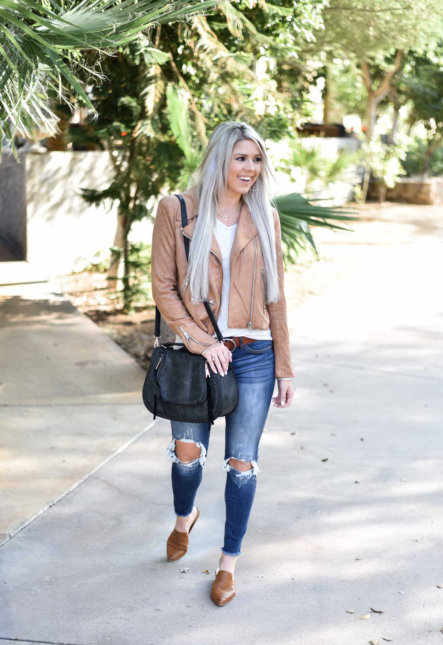 Erin Elizabeth of Wink and a Twirl shares the cutest Fall style Moto jacket from Vici Dolls 