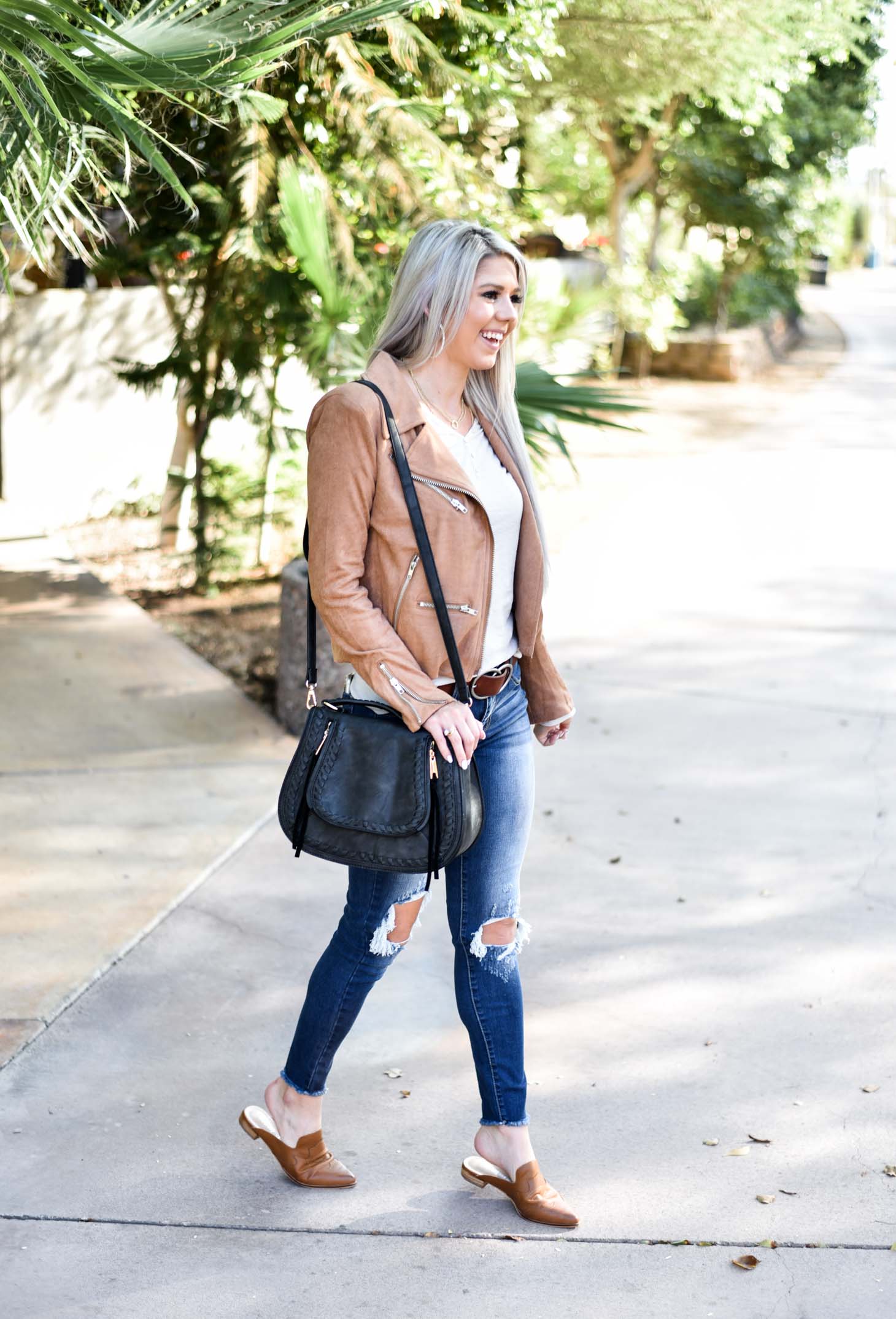 Erin Elizabeth of Wink and a Twirl shares the cutest Fall style Moto jacket from Vici Dolls 