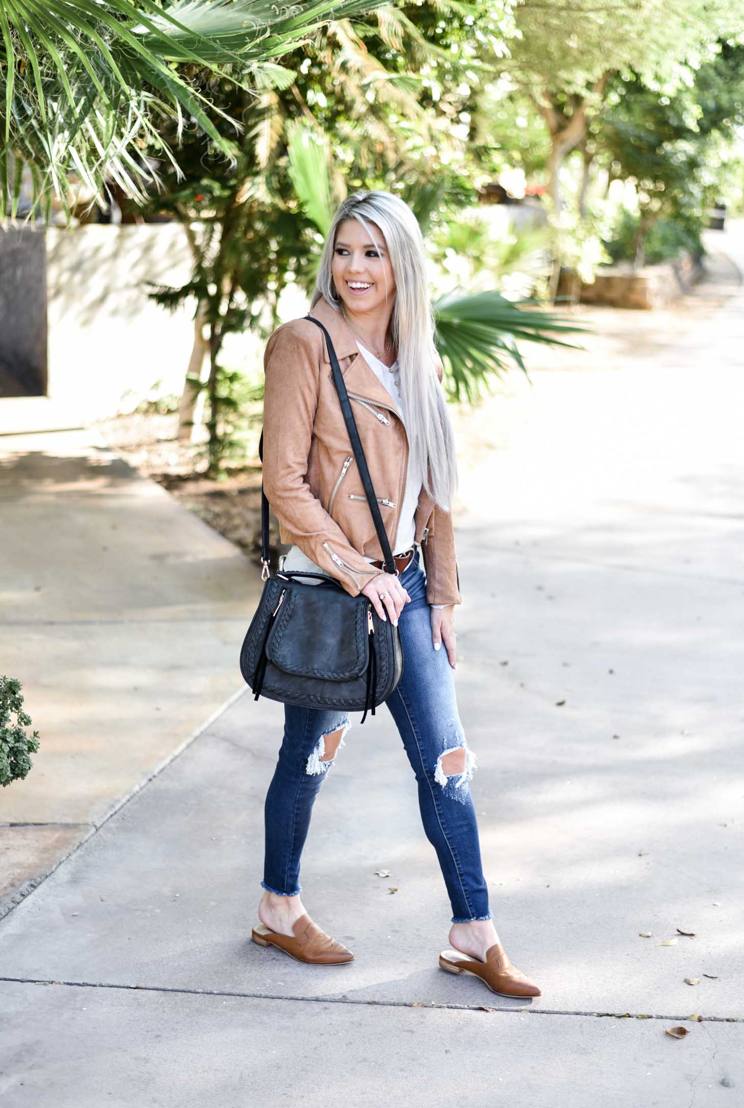 Erin Elizabeth of Wink and a Twirl shares the cutest Fall style Moto jacket from Vici Dolls 