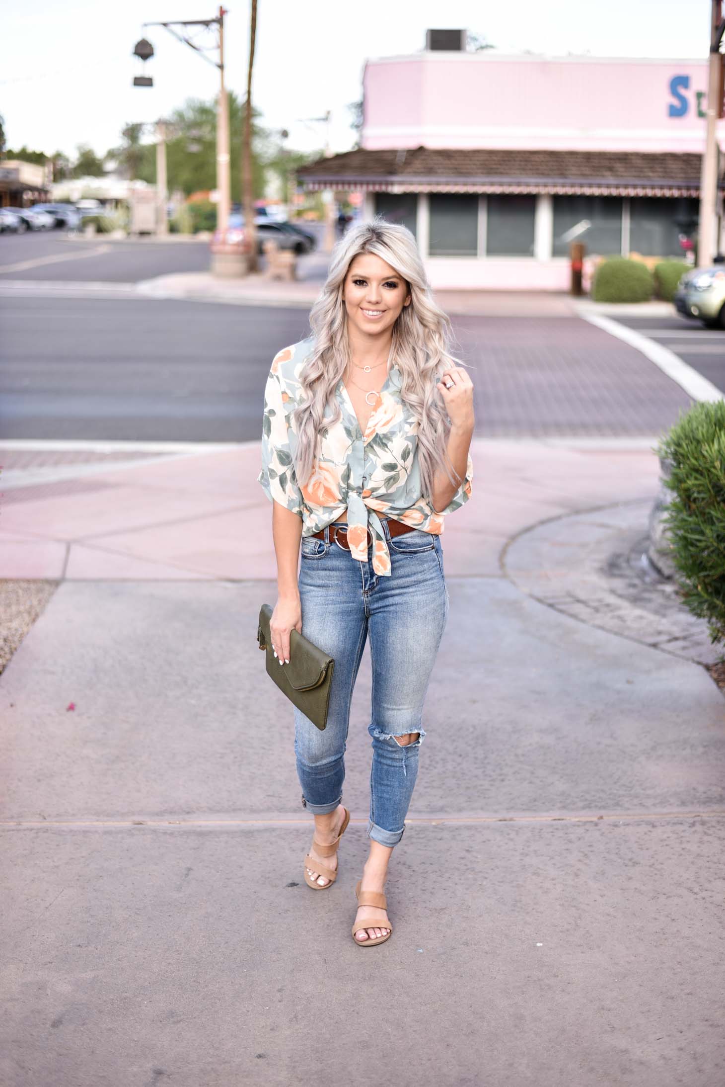 Erin Elizabeth of Wink and a Twirl share the cutest floral tie top from 8.28 Boutique 