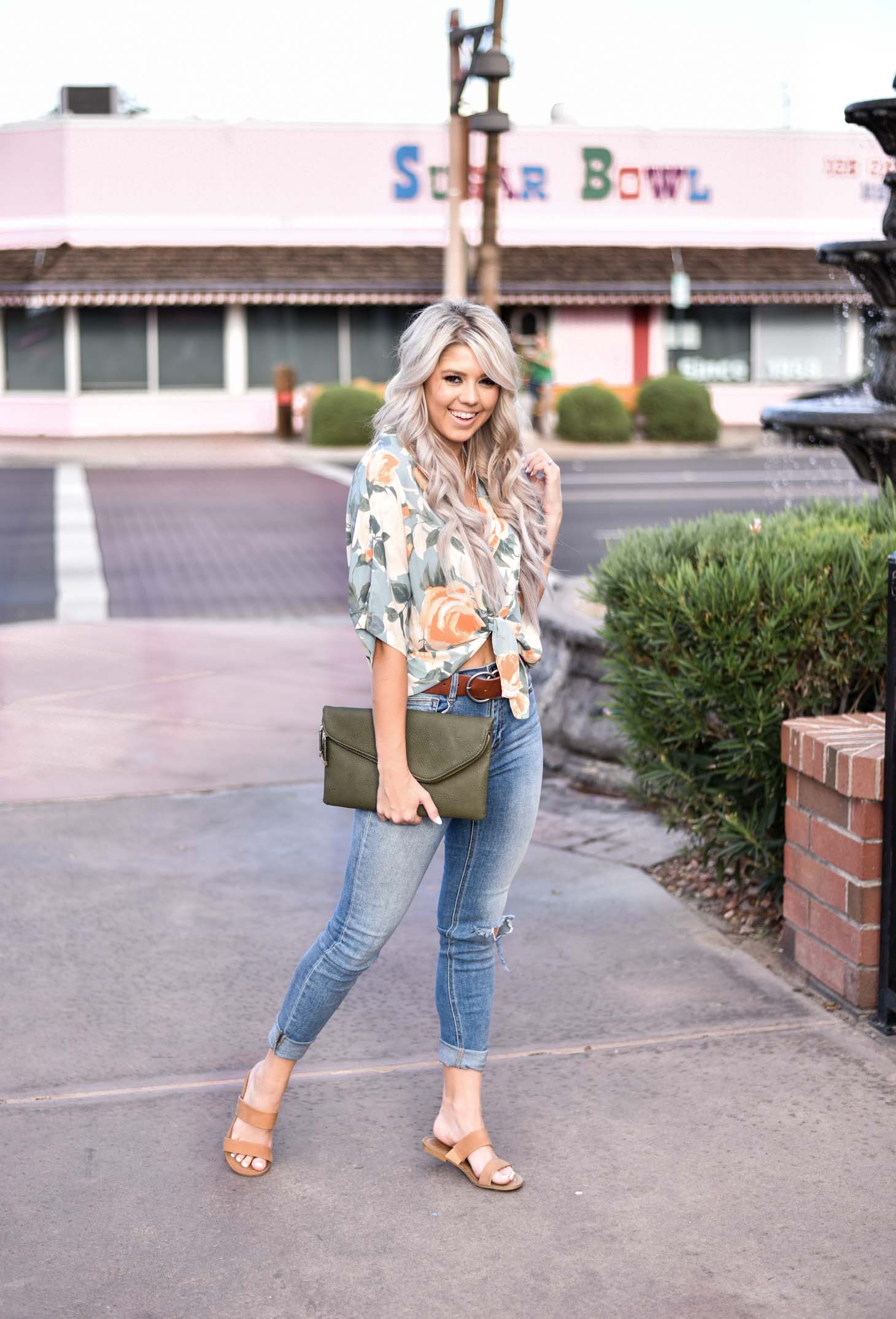 Erin Elizabeth of Wink and a Twirl share the cutest floral tie top from 8.28 Boutique 