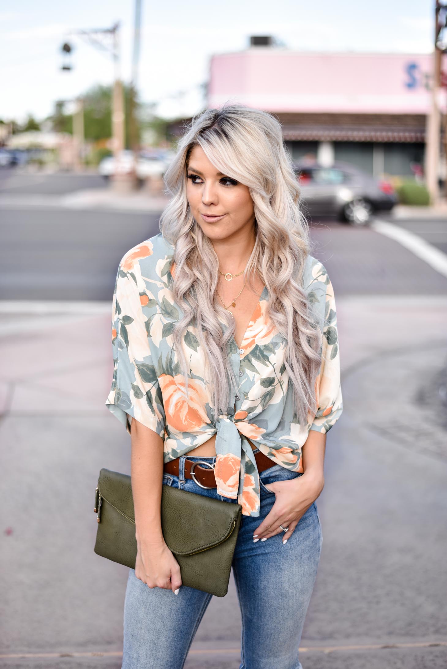 Erin Elizabeth of Wink and a Twirl share the cutest floral tie top from 8.28 Boutique 