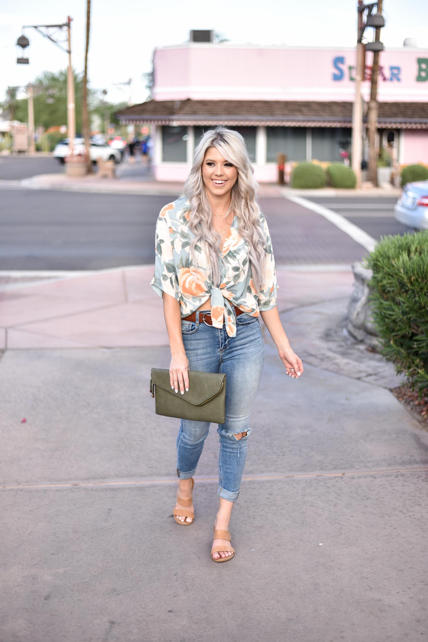 Erin Elizabeth of Wink and a Twirl share the cutest floral tie top from 8.28 Boutique 