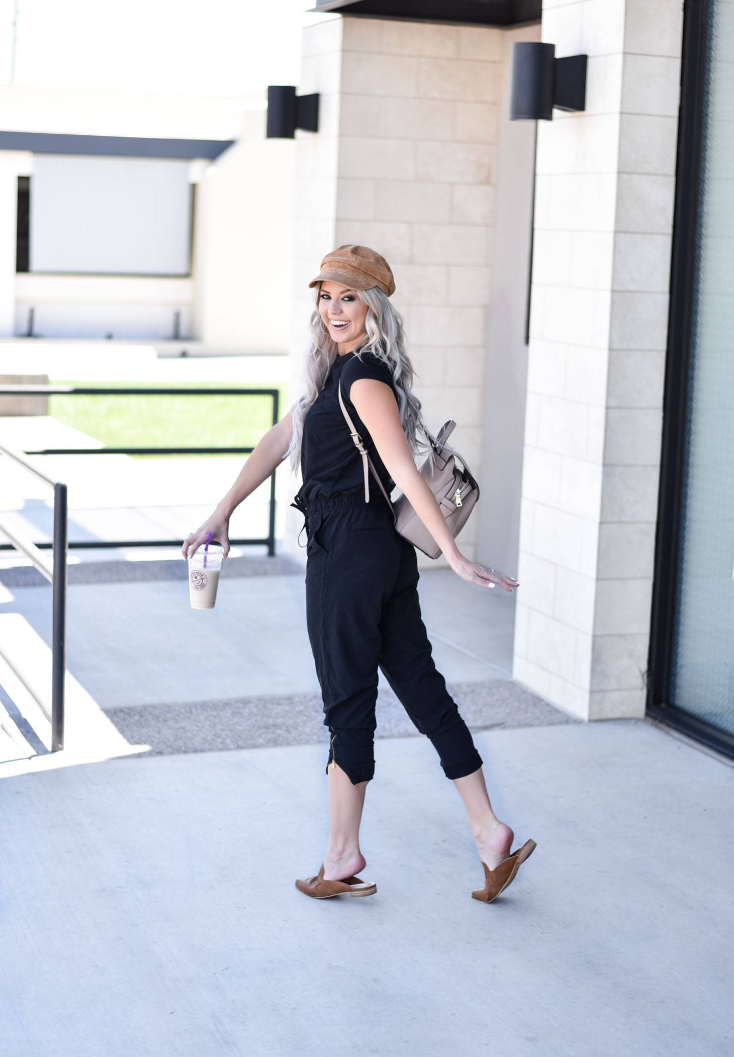 Erin Elizabeth of Wink and a Twirl share the cutest Albion Fit jumpsuit for their Jump for Jetsetters Campaign