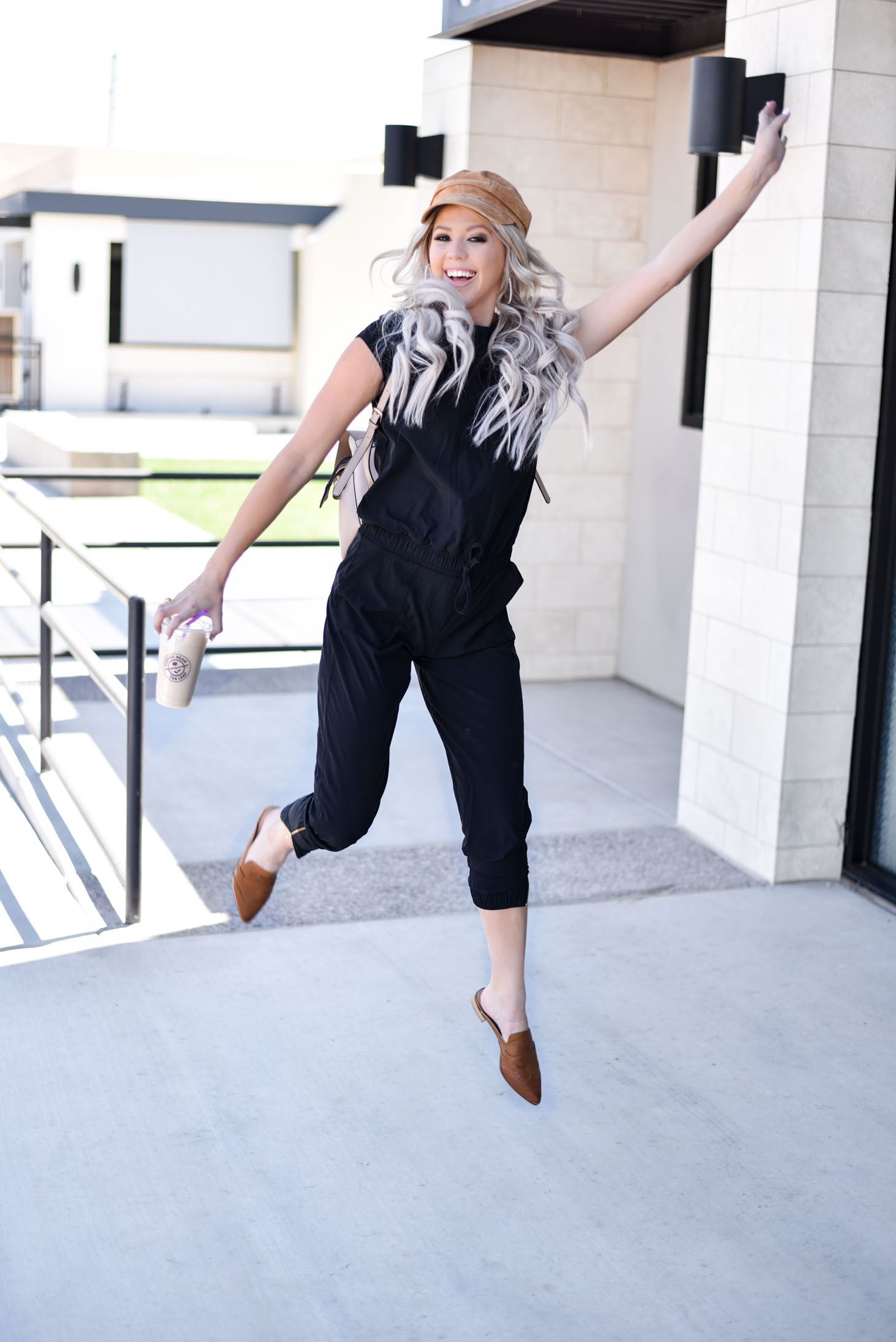 Erin Elizabeth of Wink and a Twirl share the cutest Albion Fit jumpsuit for their Jump for Jetsetters Campaign