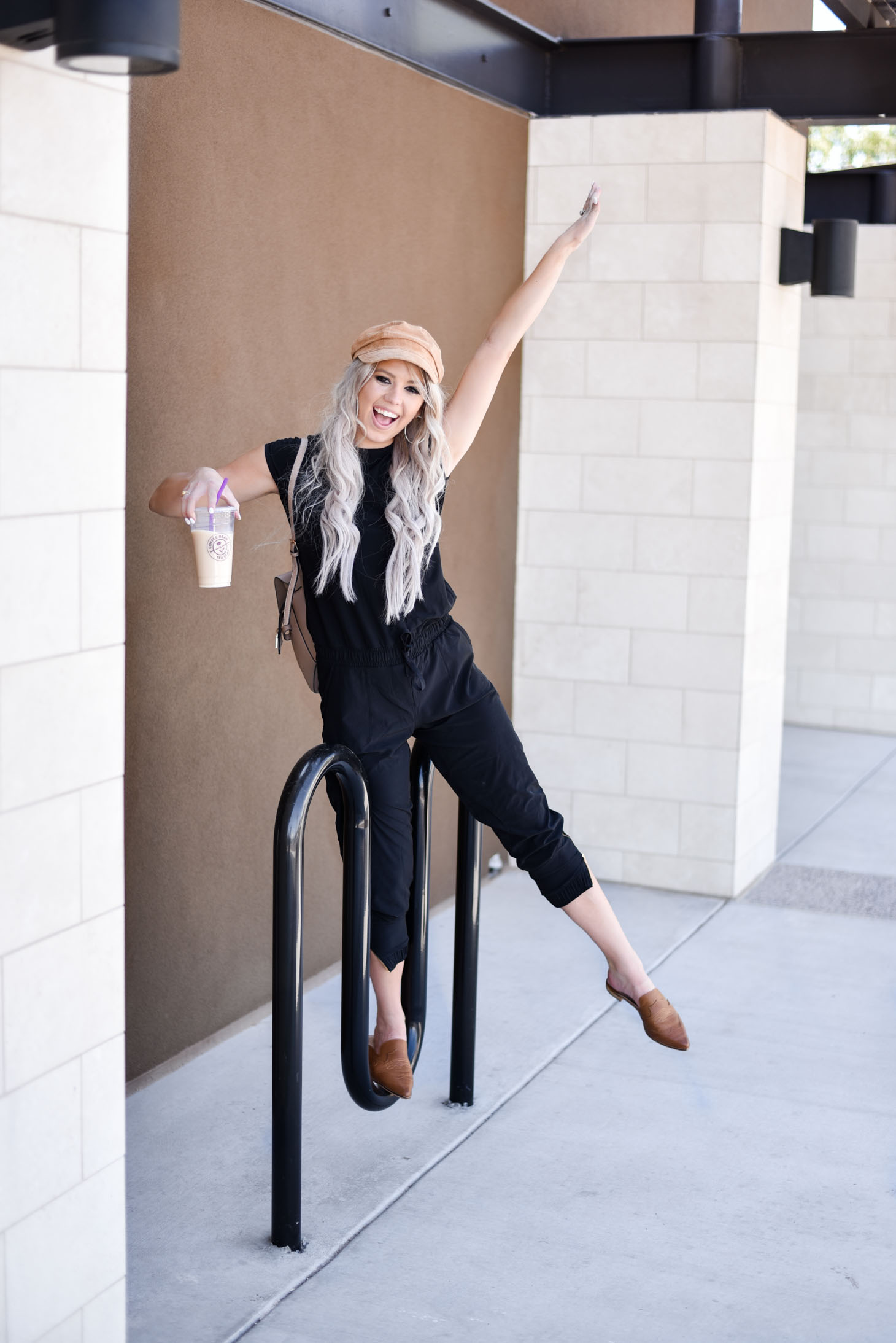 Erin Elizabeth of Wink and a Twirl share the cutest Albion Fit jumpsuit for their Jump for Jetsetters Campaign