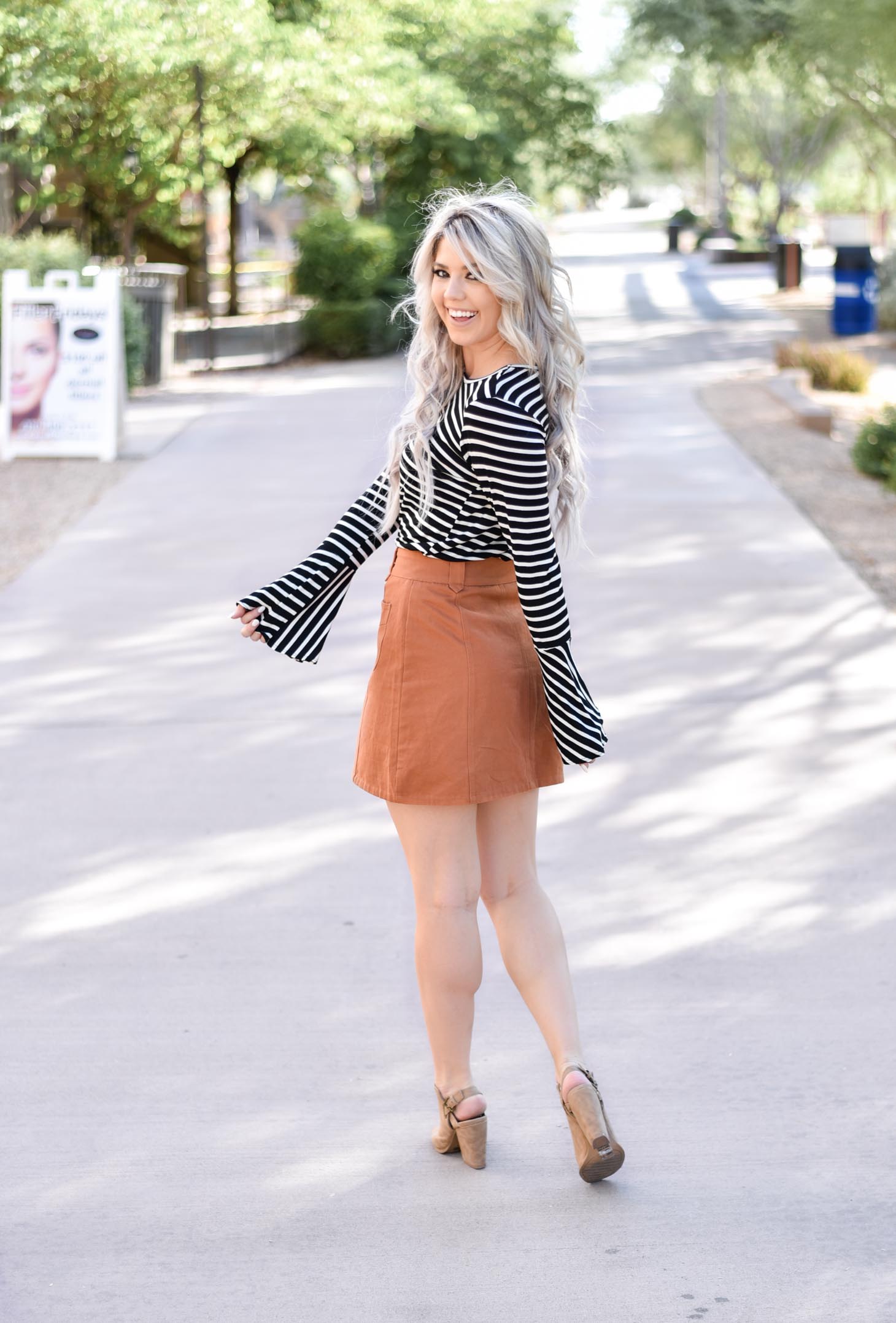 Erin Elizabeth of Wink and a Twirl shares two ways to style a striped top from Pink Lily Boutique perfect for your fall style this year