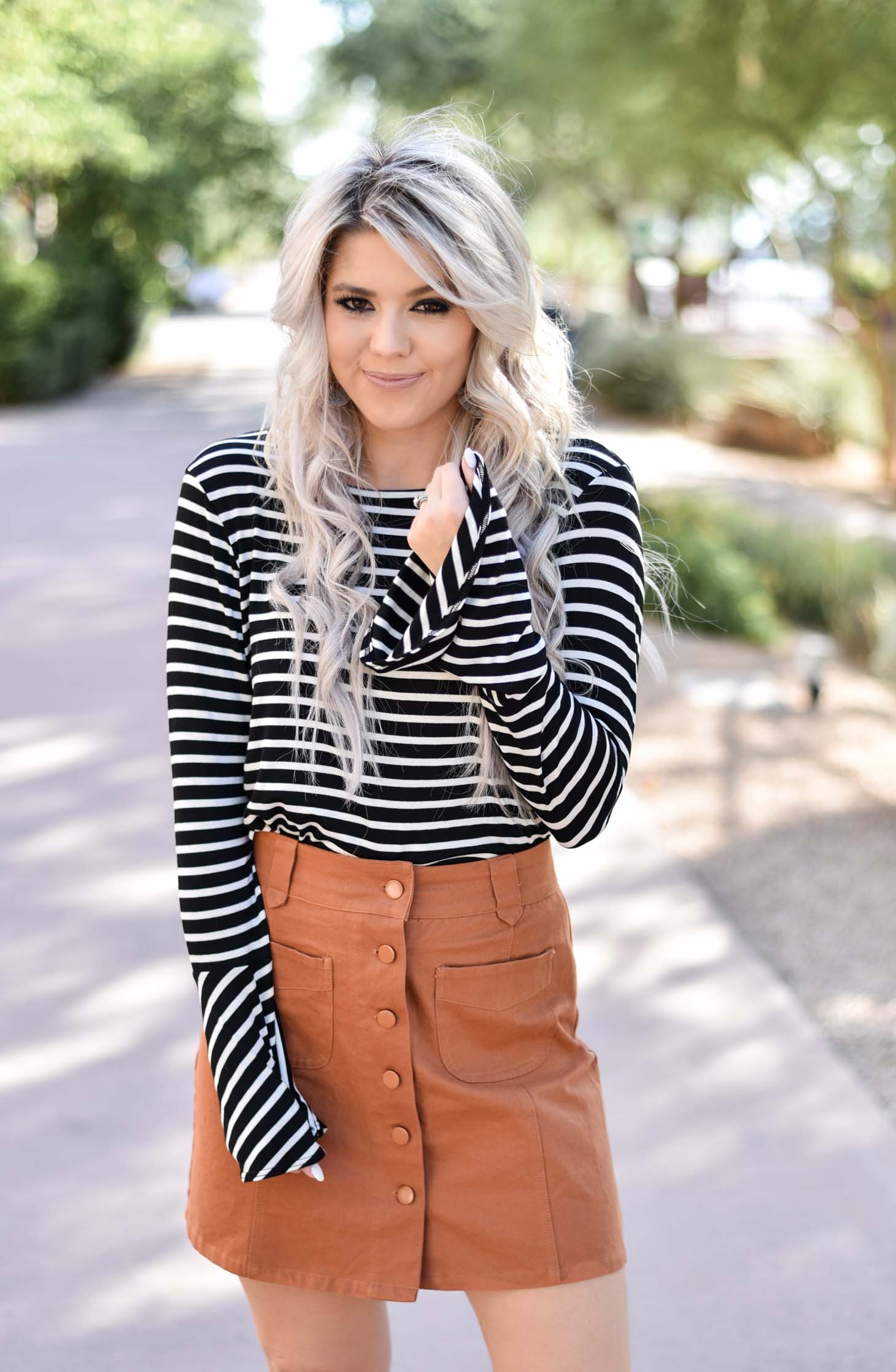 Erin Elizabeth of Wink and a Twirl shares two ways to style a striped top from Pink Lily Boutique perfect for your fall style this year
