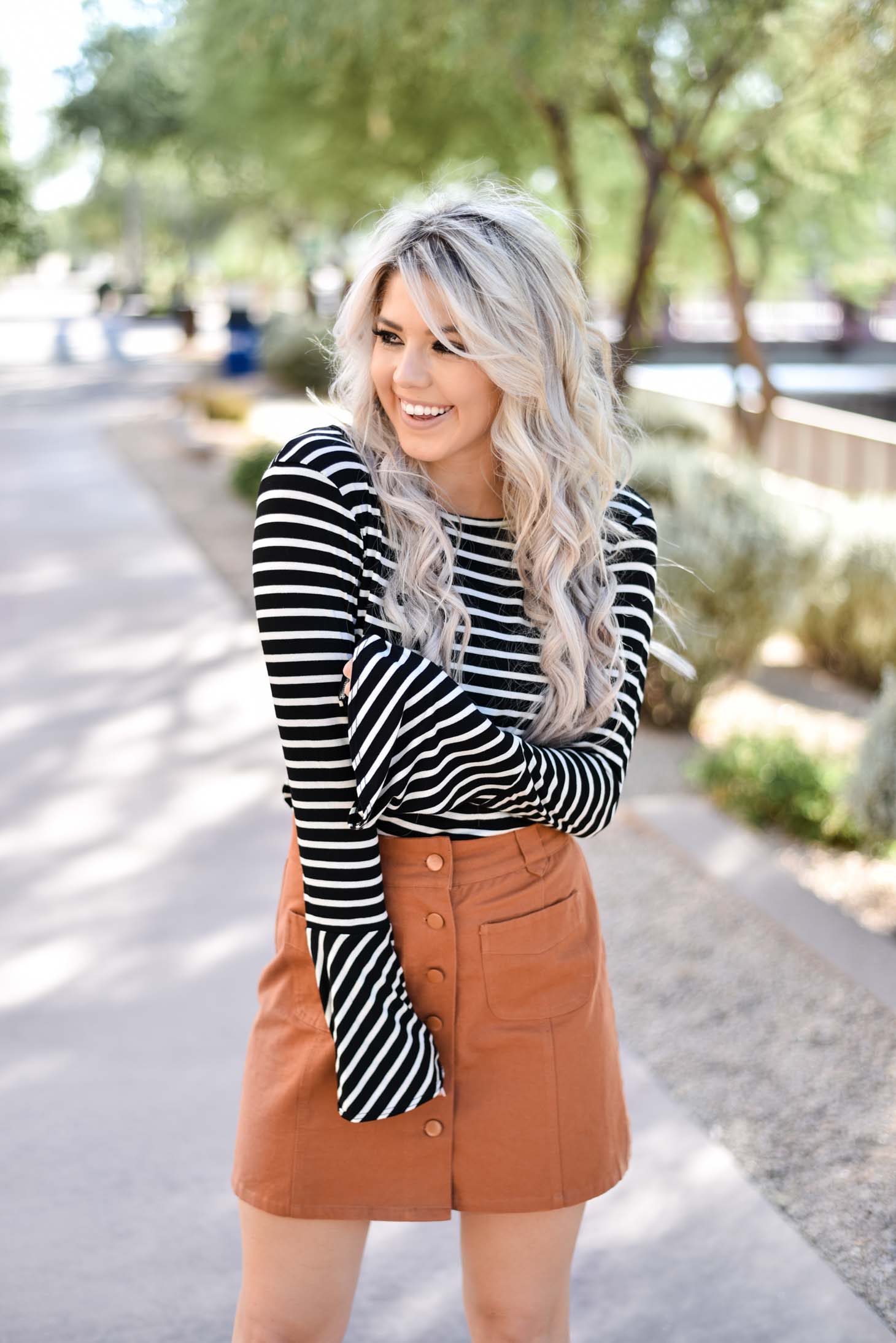 Erin Elizabeth of Wink and a Twirl shares two ways to style a striped top from Pink Lily Boutique perfect for your fall style this year