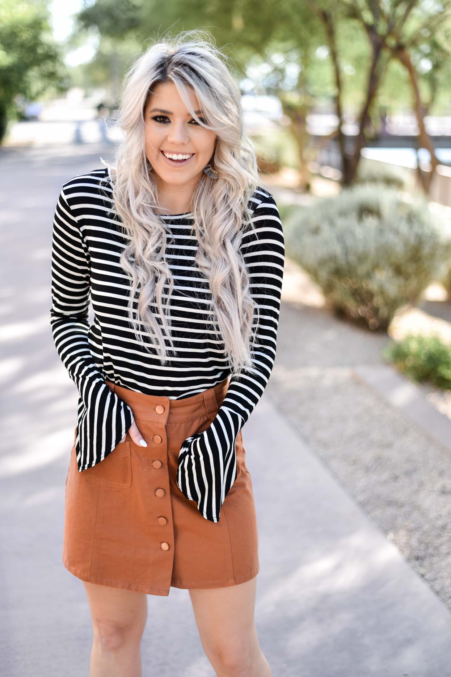 Erin Elizabeth of Wink and a Twirl shares two ways to style a striped top from Pink Lily Boutique perfect for your fall style this year