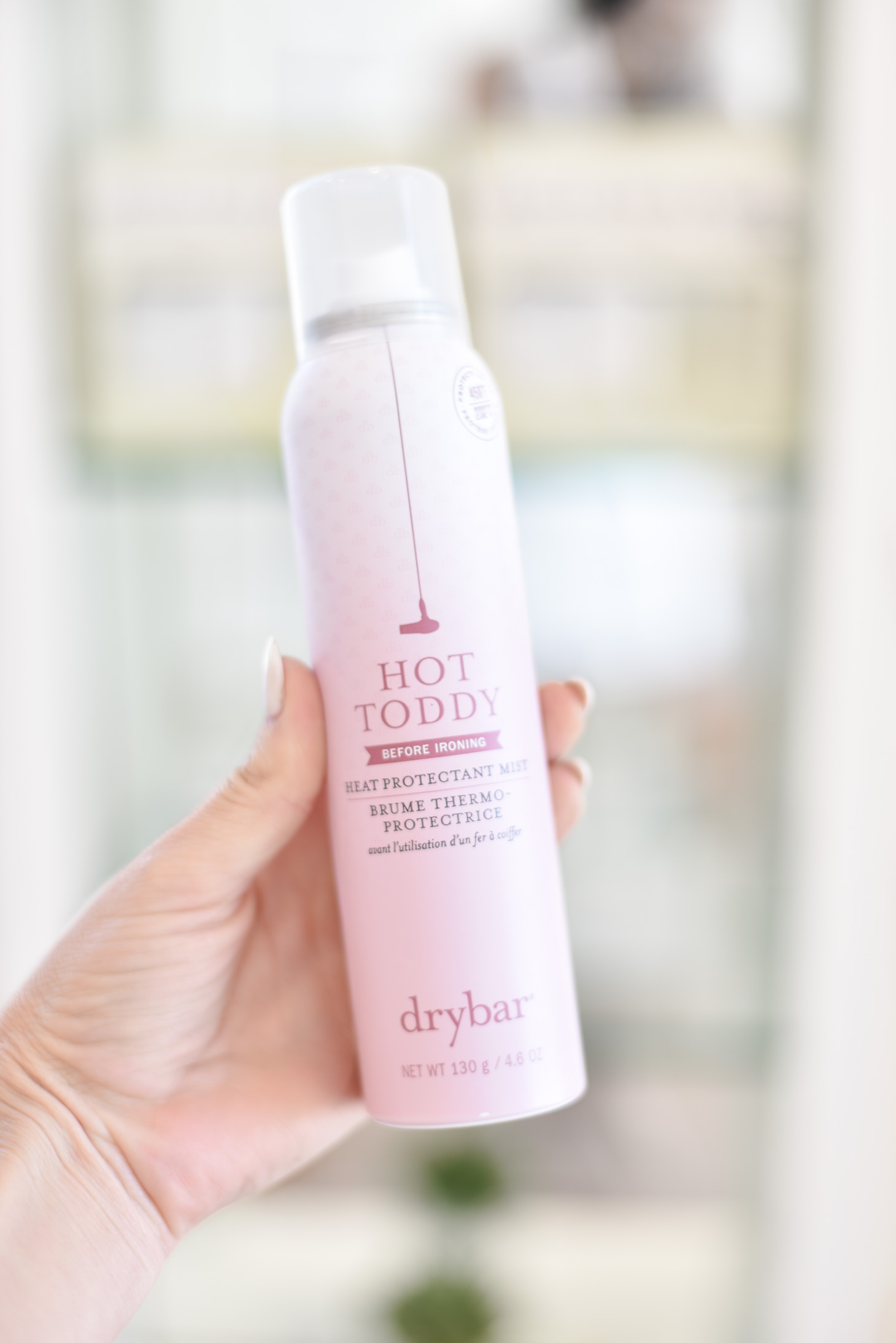 Erin Elizabeth of Wink and a Twirl shares the Drybar's latest product: the Hot Toddy Heat Protectant Mist