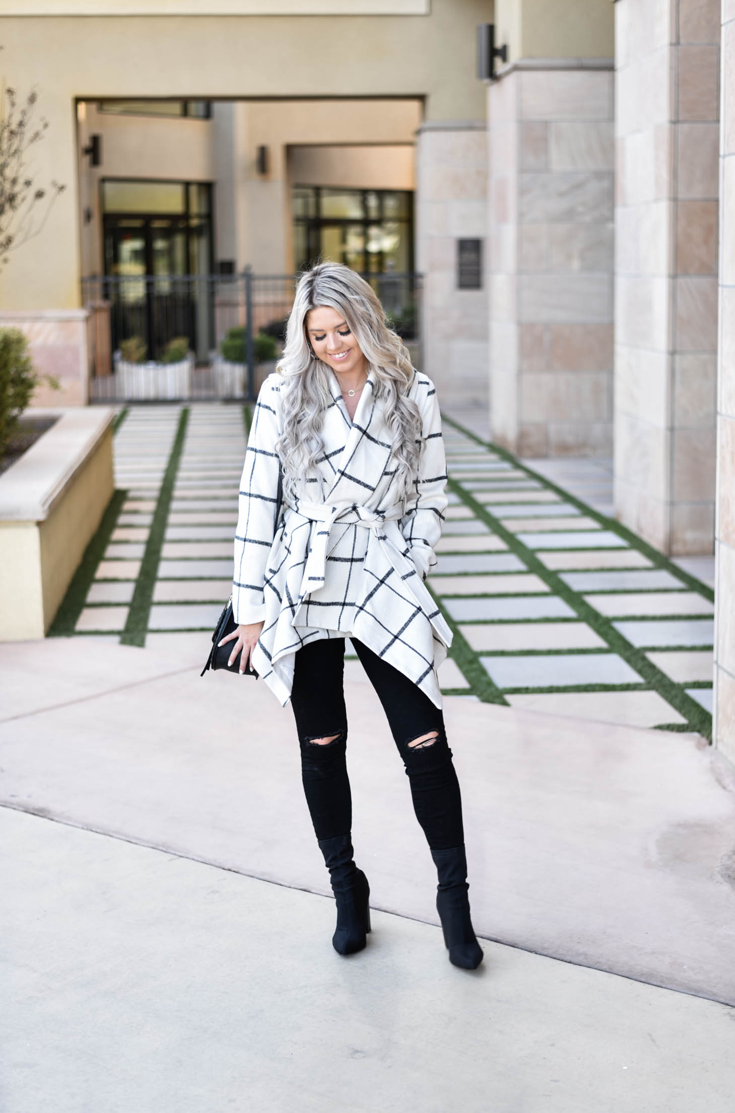 Erin Elizabeth of Wink and a Twirl shares the must have coat for Fall and Winter from Chicwish