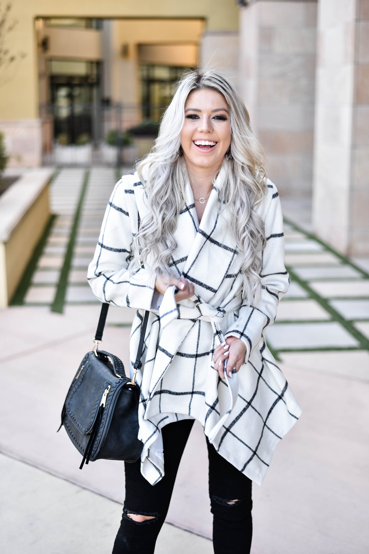 Erin Elizabeth of Wink and a Twirl shares the must have coat for Fall and Winter from Chicwish